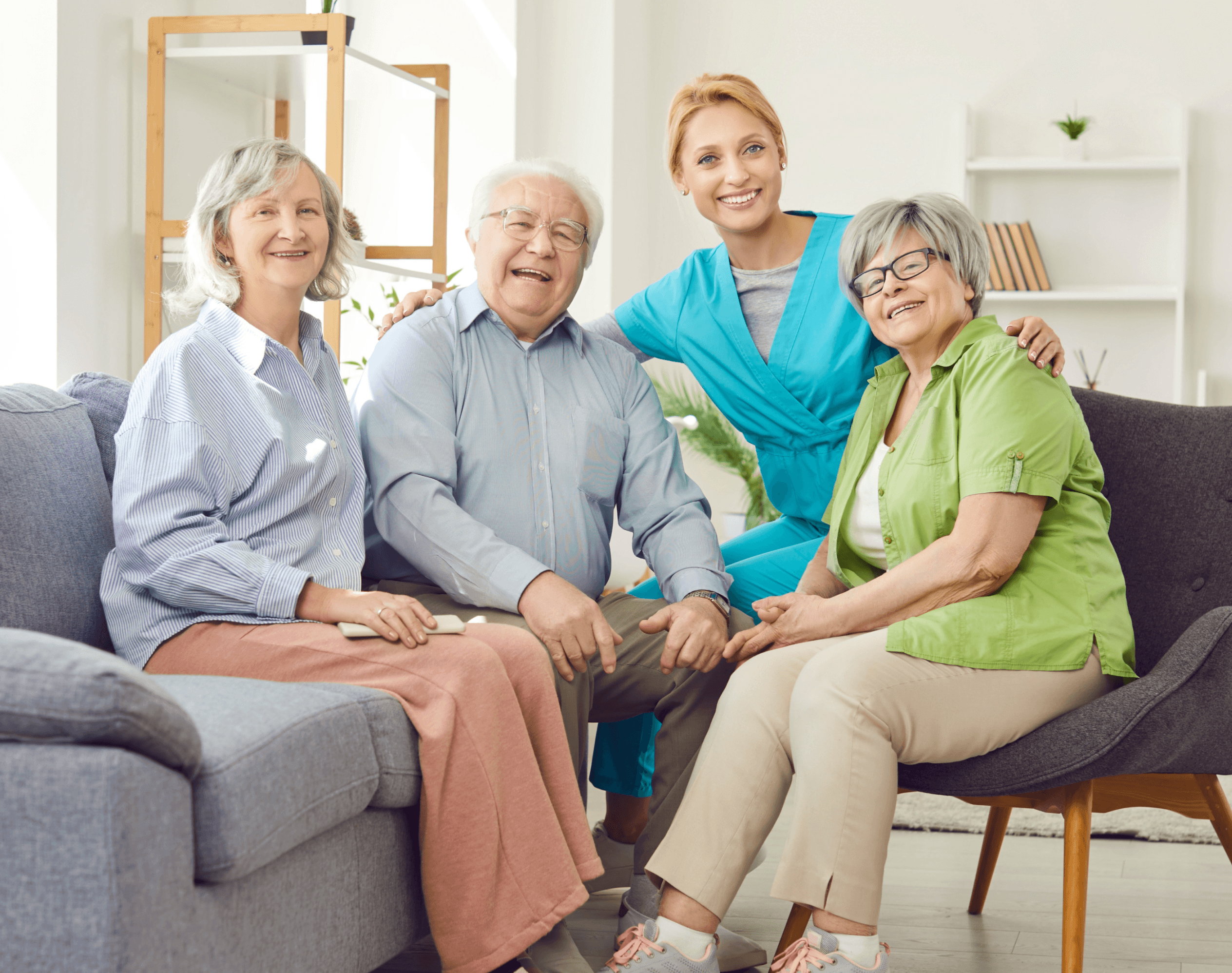 Friendly caregiver sitting with an elderly family.
