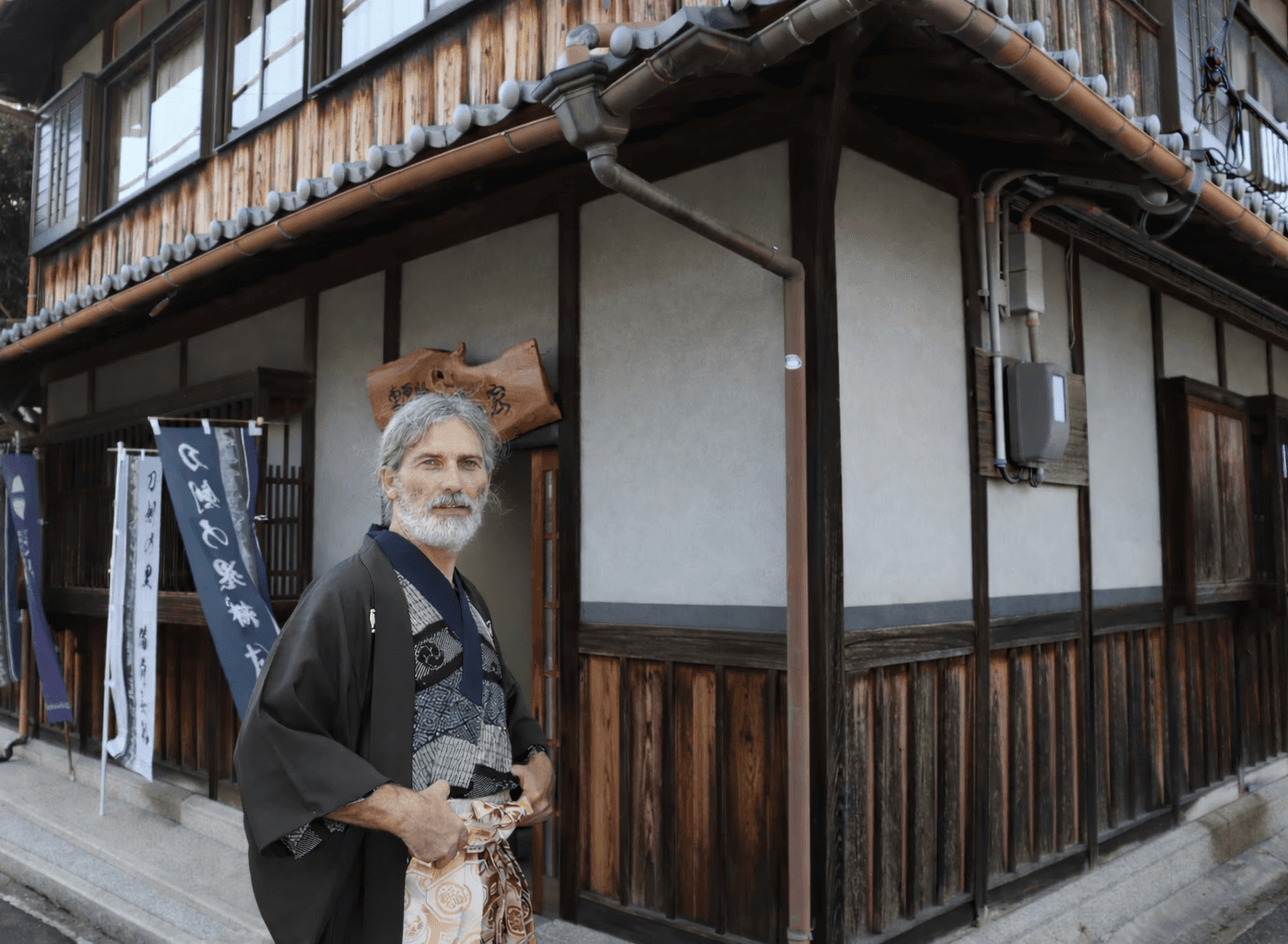 Swordsmiths hammering iron in a team