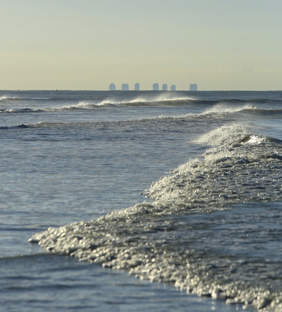 Green aurora lights in the sky at night