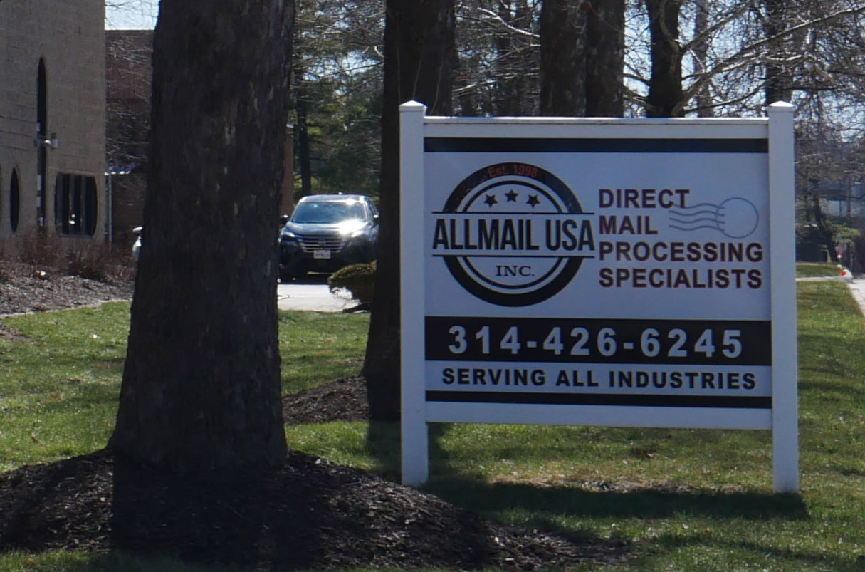 Daytime photo of the front entrance to Allmail USA, Inc.