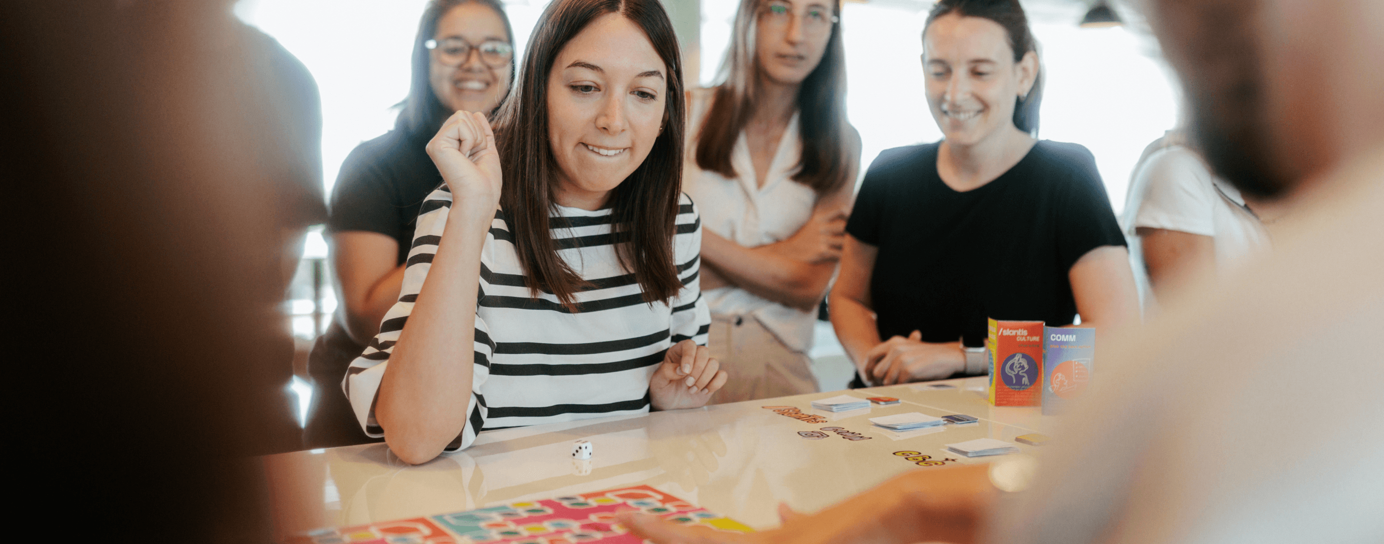 coworkers playing a board game