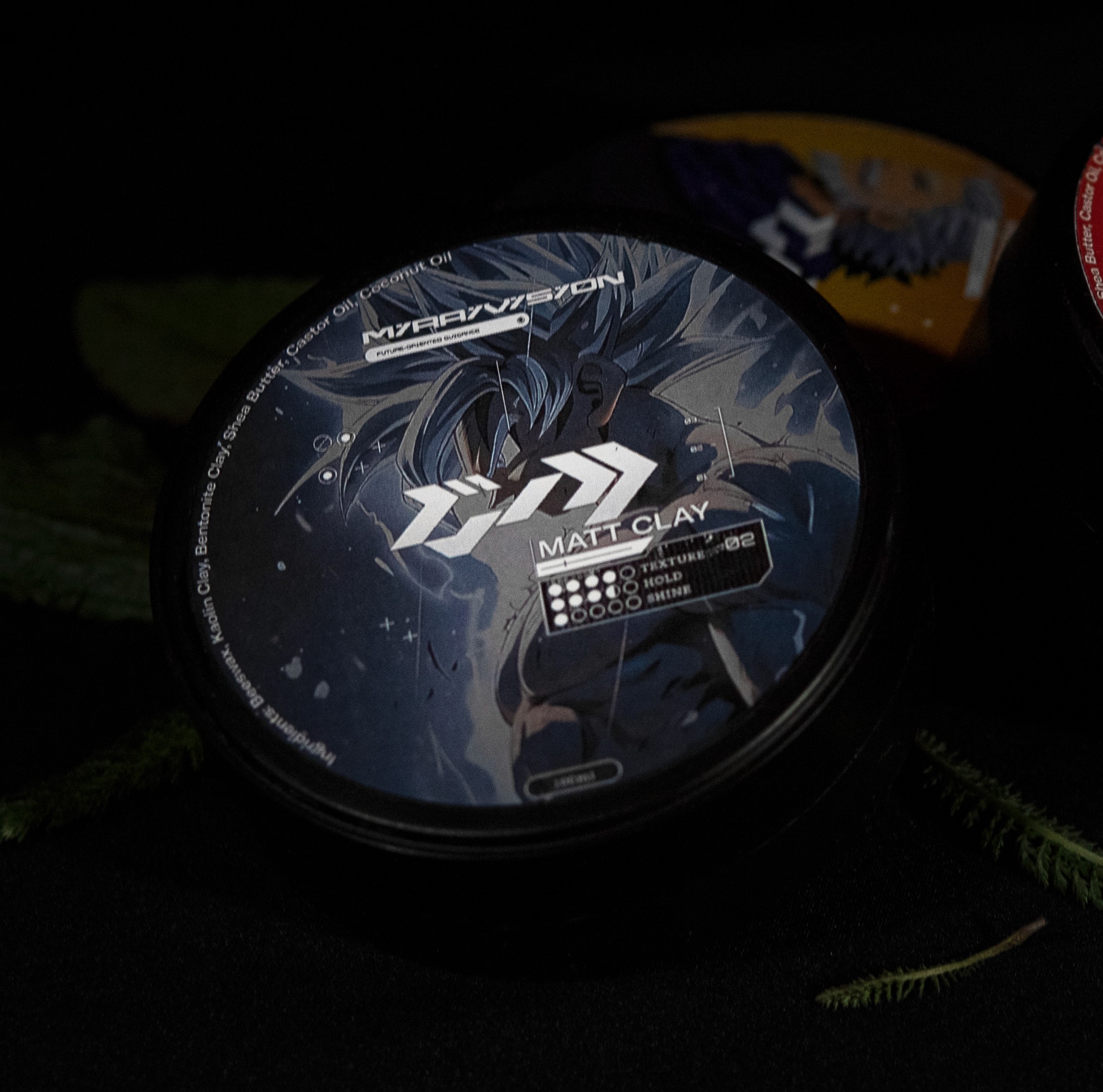 a bottle of red wine with a black background