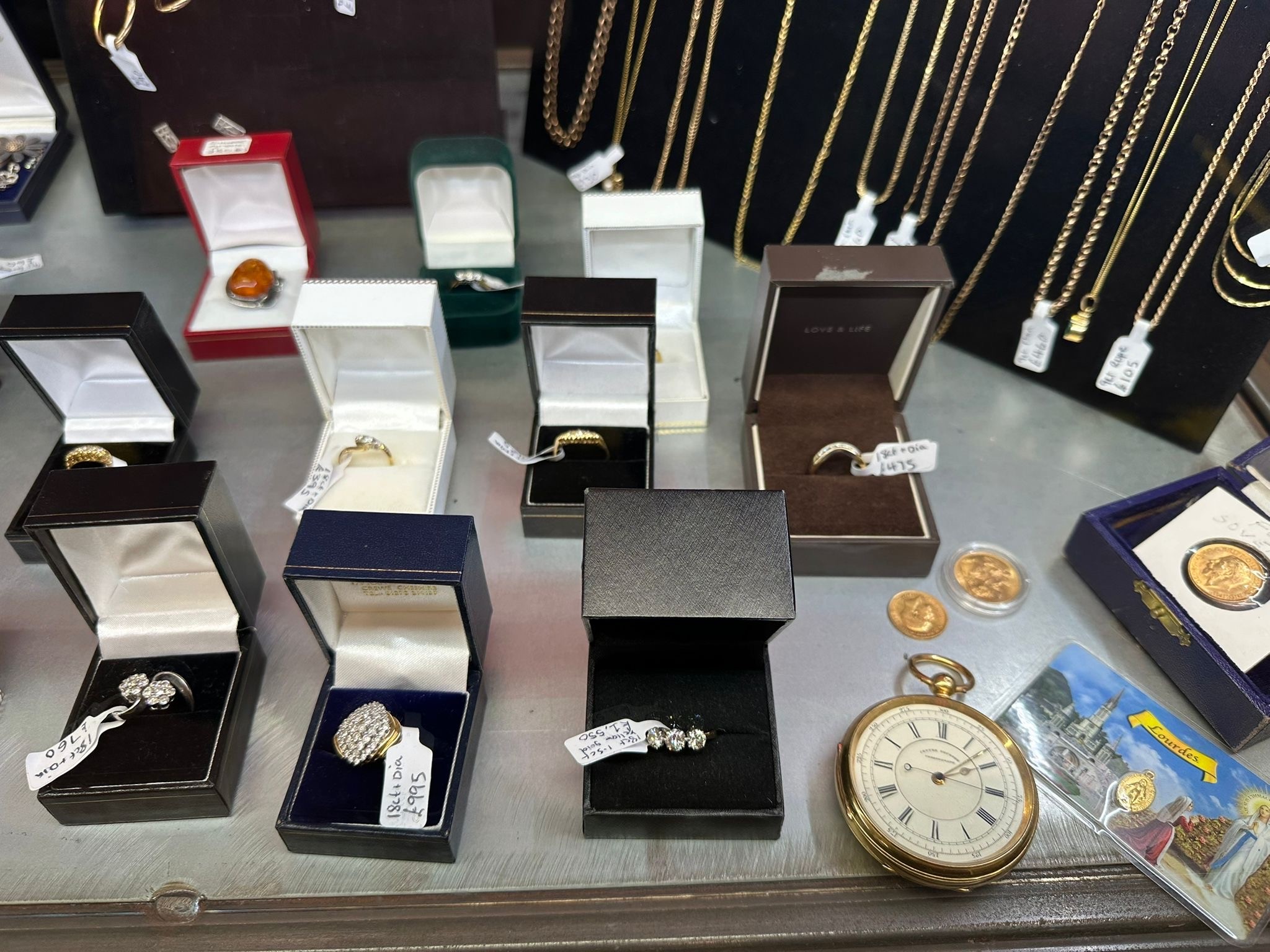 Gold rings and a pocket watch