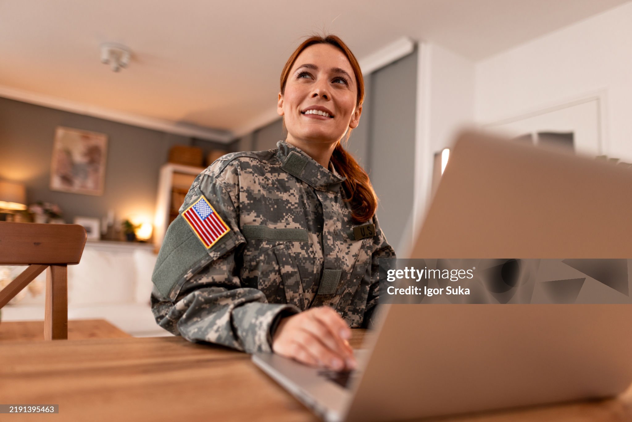 Man carrying a package outside a building