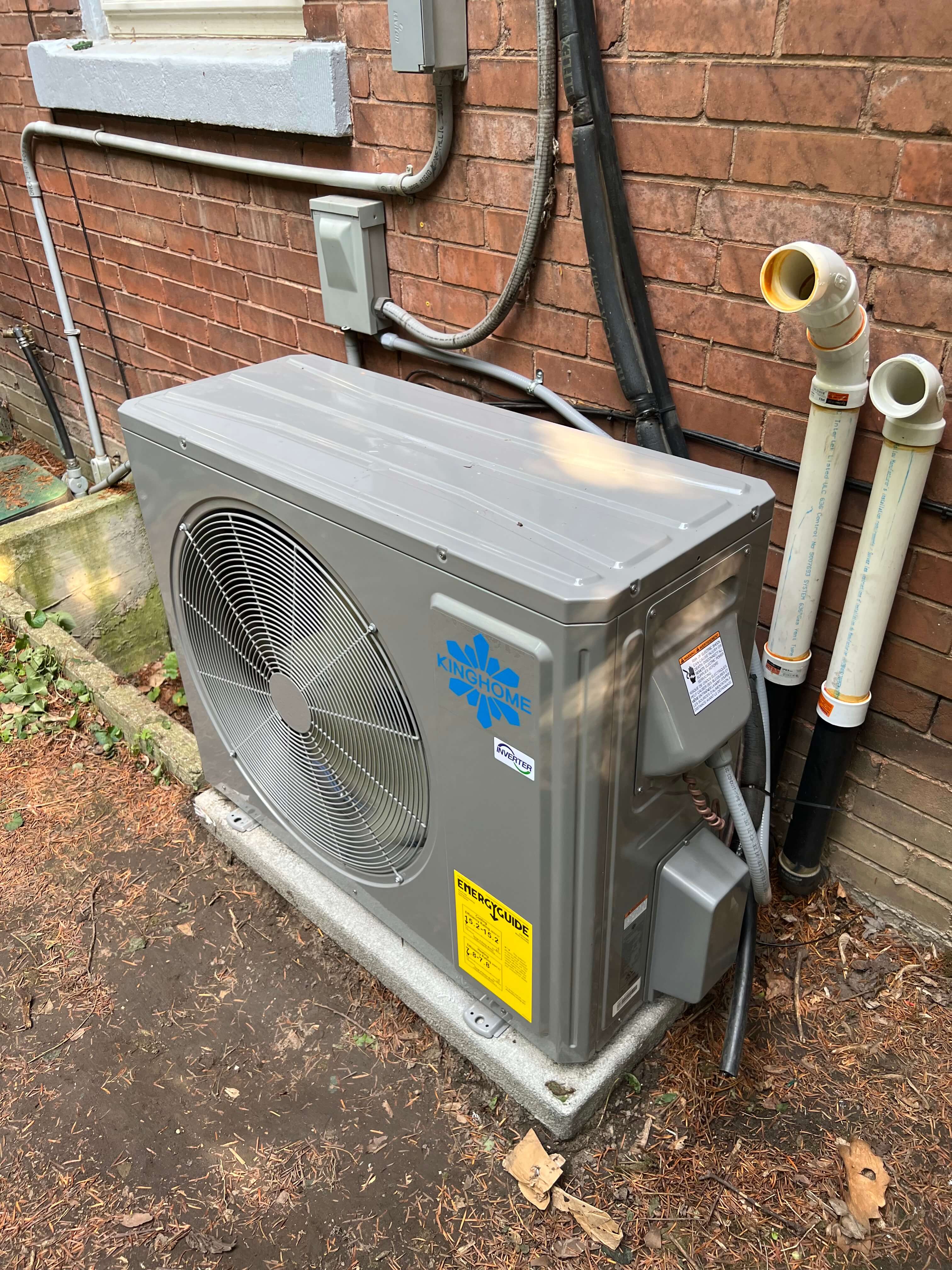 heat pump installation in backyard of toronto home