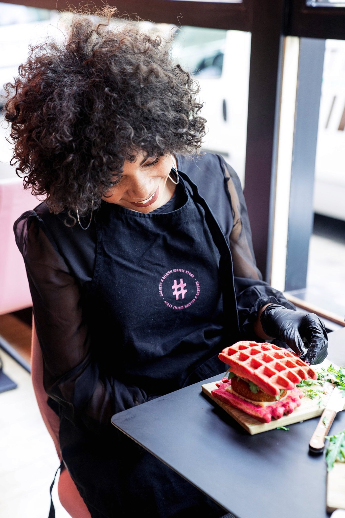 Orange outline of a smiley face with the text “Smiley Co” in orange serif type on a clean white background.