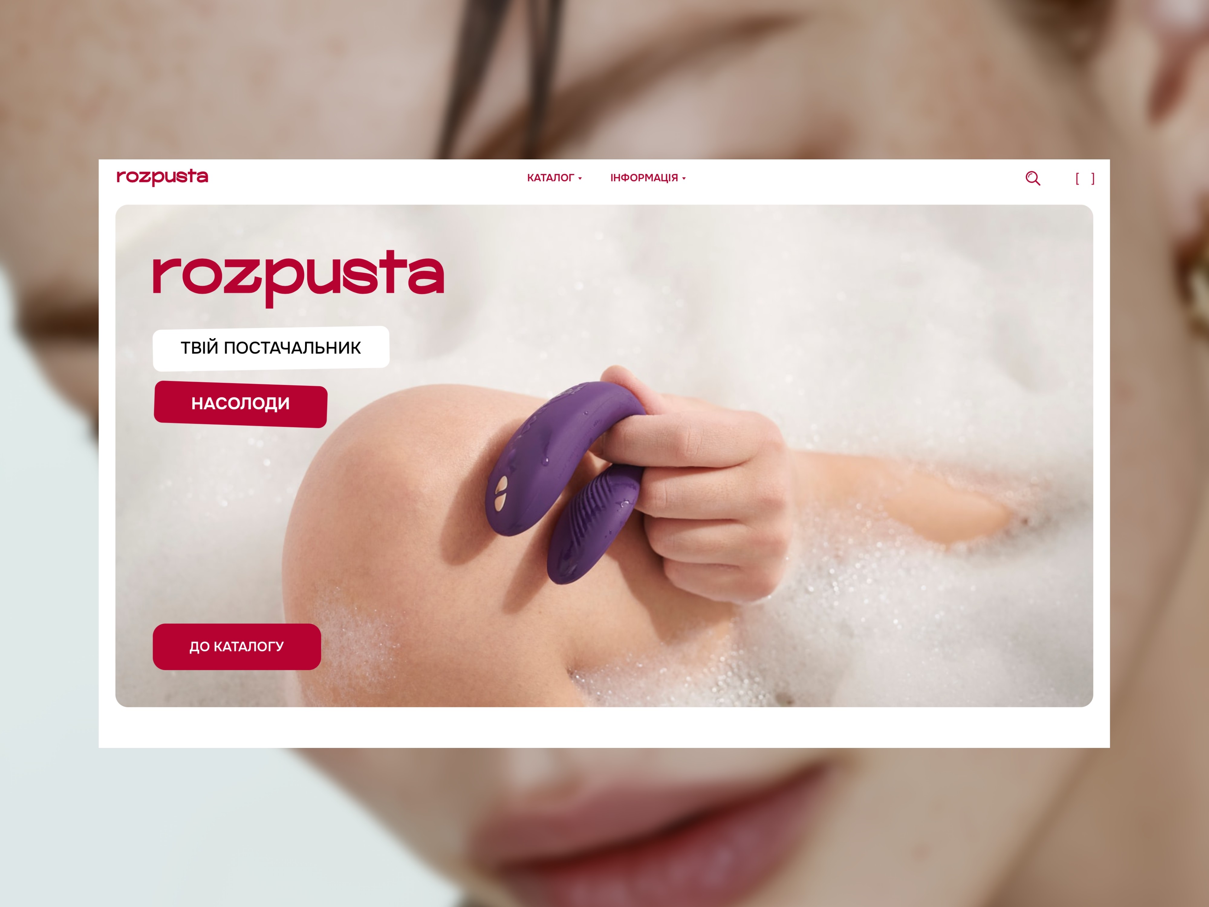 rozpusta website with a person in a bubble bath holding a purple sex toy, next to two red buttons