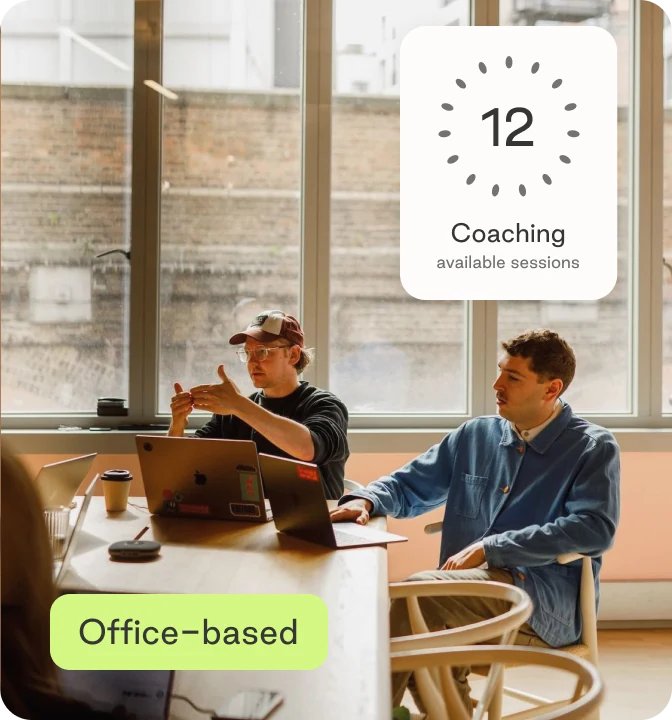 Office-based colleagues at a desk, with available coaching sessions