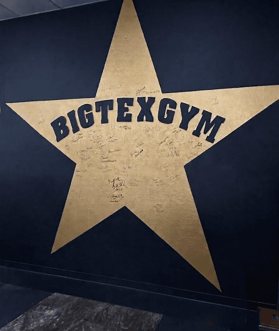 Big Tex Gym wall sign with member signatures at Big Tex Gym, Austin TX