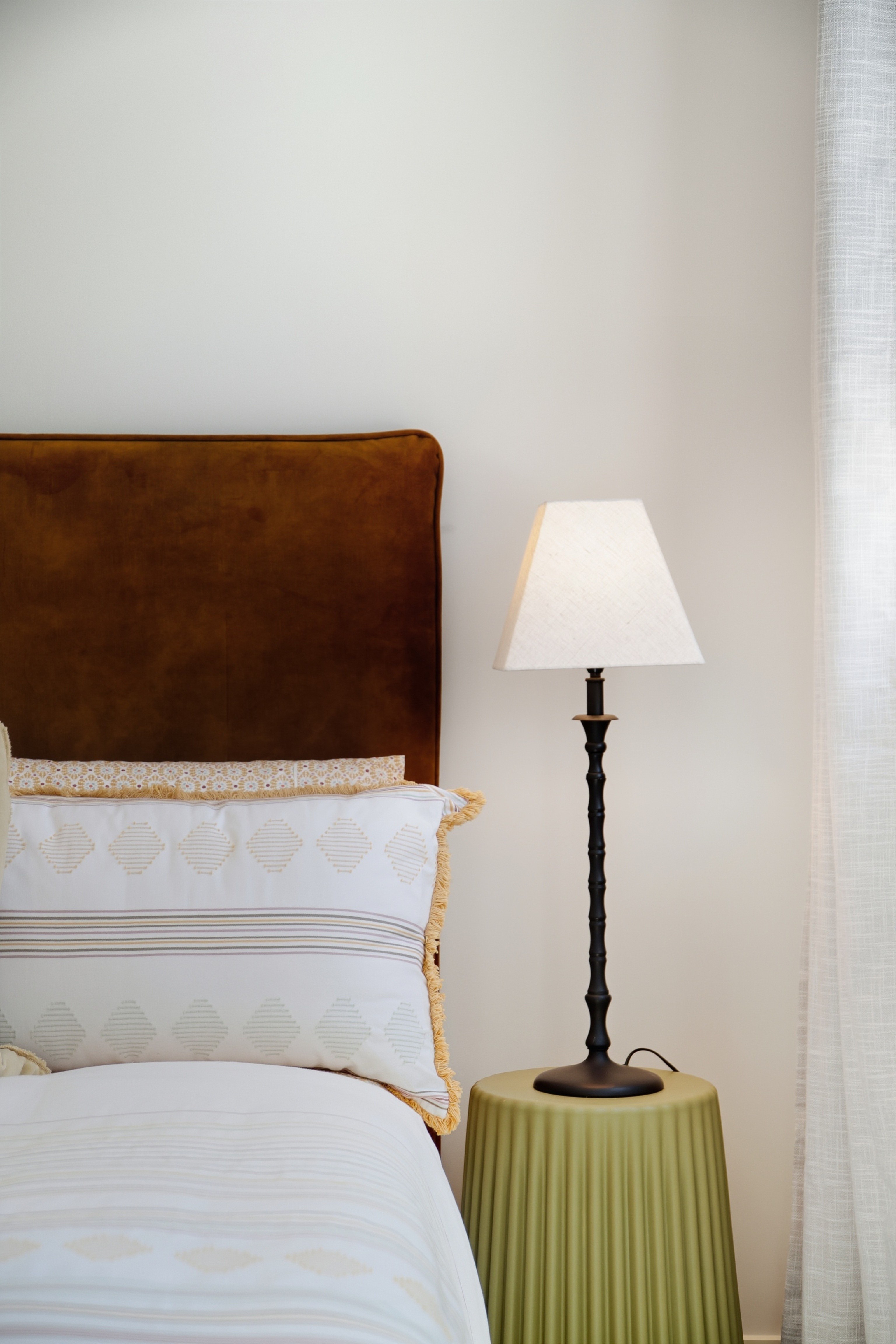 person sitting in a chair in front of a man