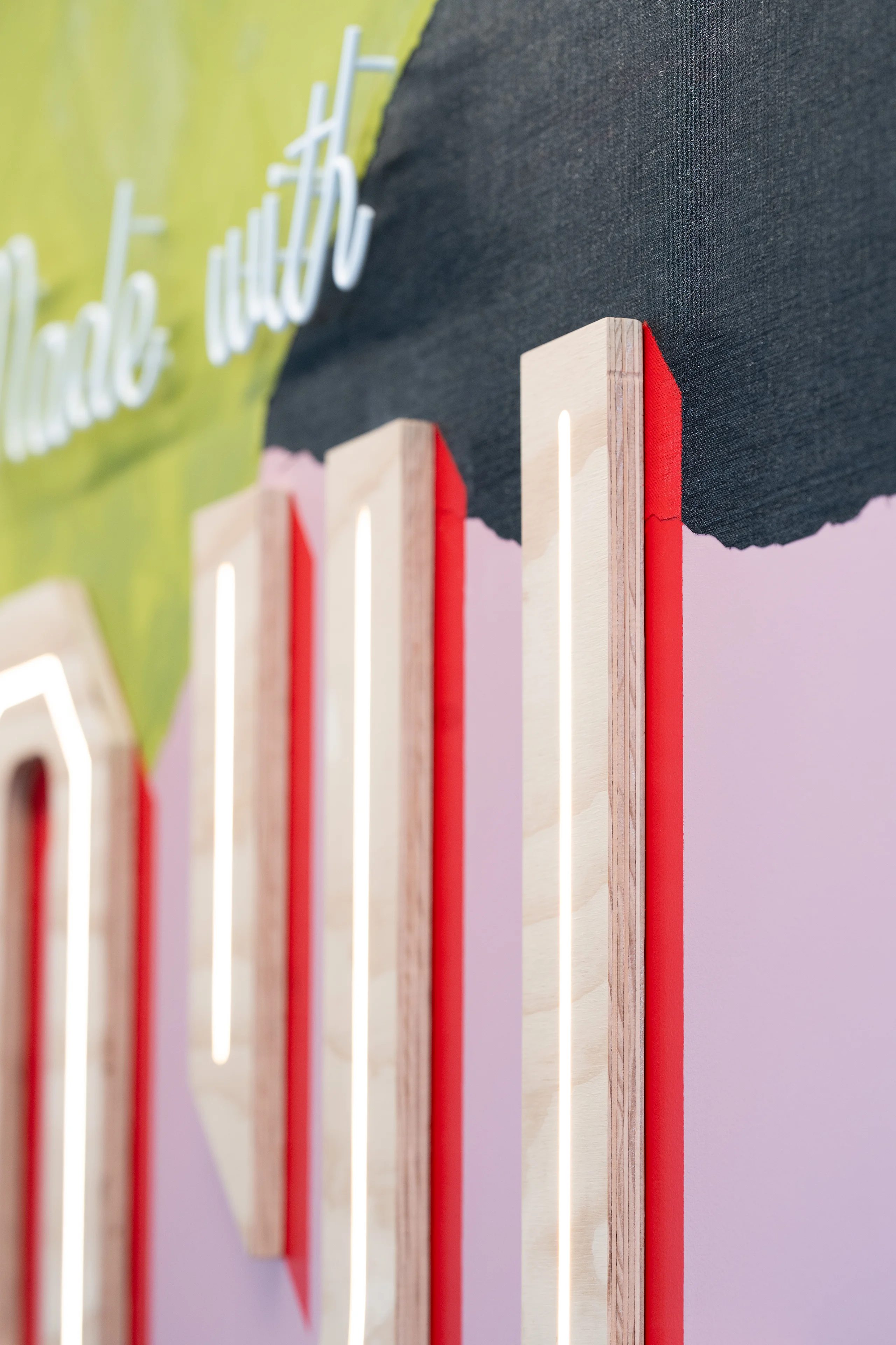 Streetside billboard with flyposters of the Batch.Works brand and illustrations