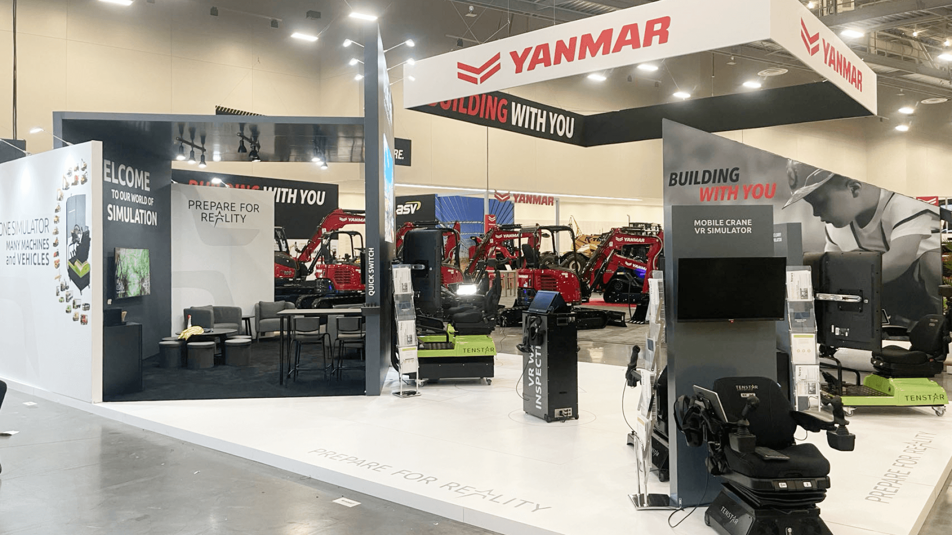 Industrial machinery trade show booth in las-vegas featuring equipment demos, AV displays, and reinforced structural build
