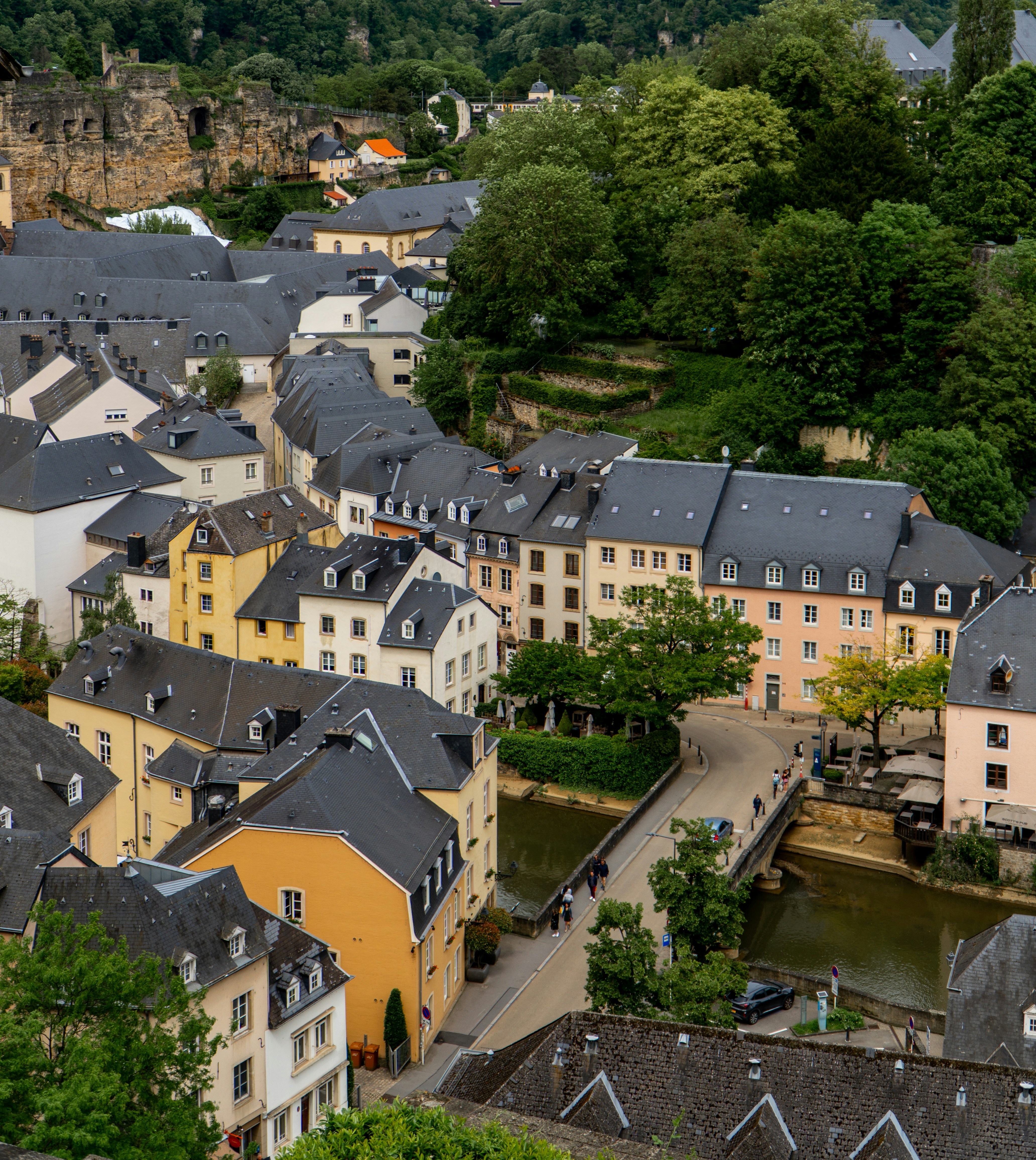An aerial view of a city with a river running through it