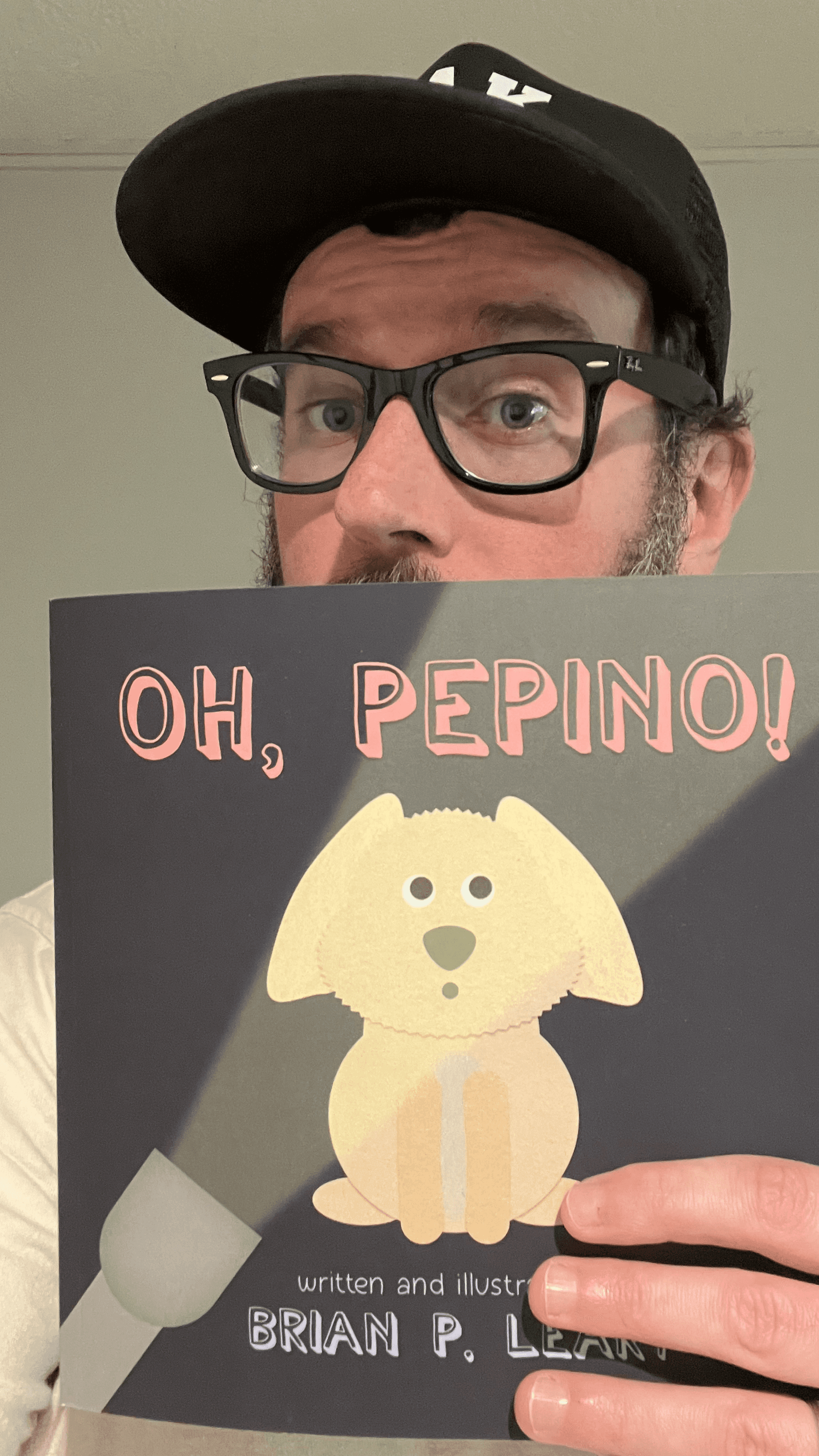 Goof holding his book