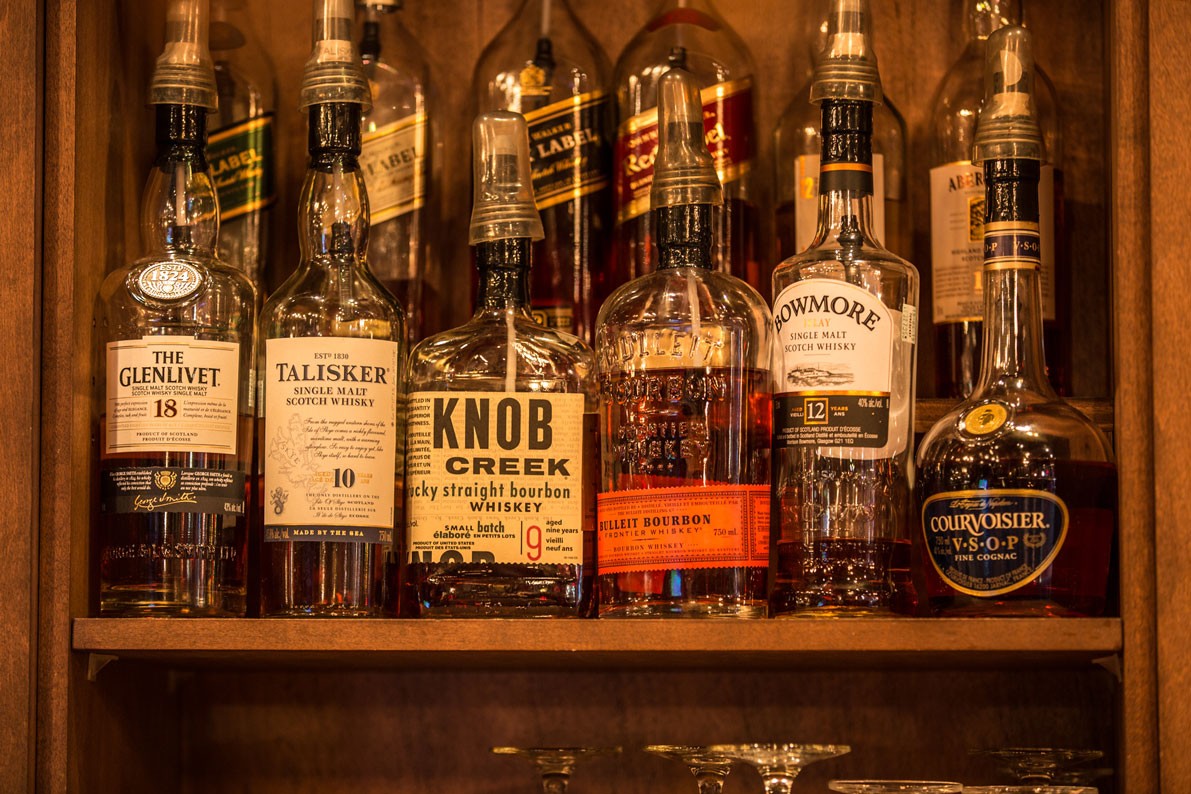 A disco ball hangs from a white ceiling.