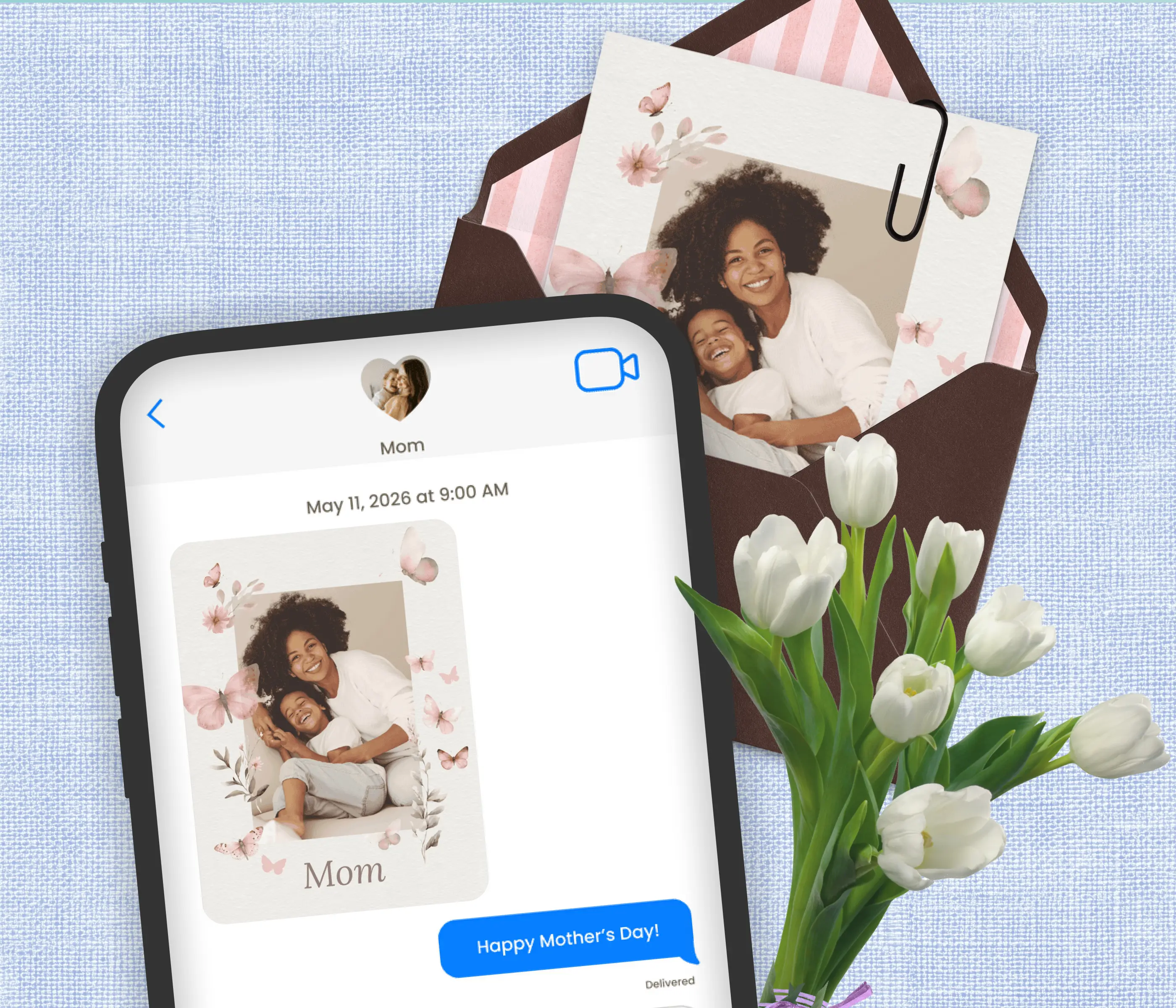 Customized Mother's Day greeting card shown on a phone and as a printed card in an envelope with tulips
