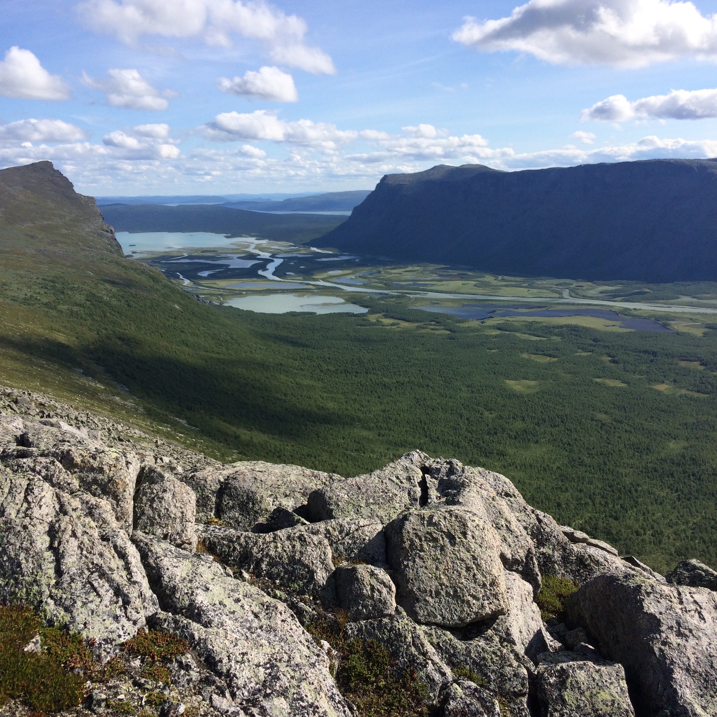 person sitting in a chair in front of a man