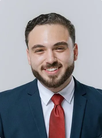 a young man showing teeth