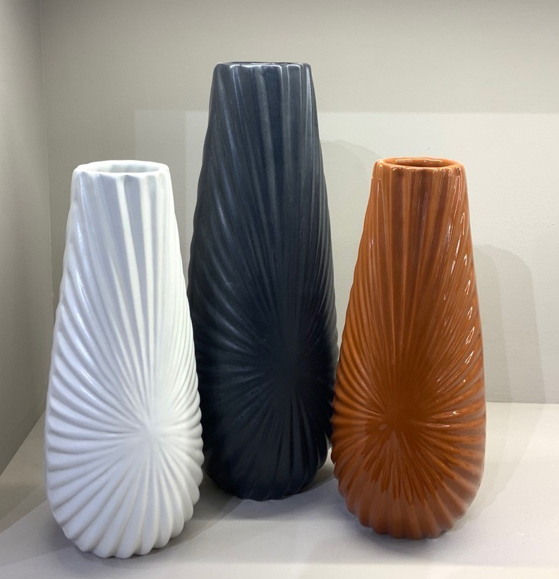 Spiral textured ceramic vases in white black and brown colors