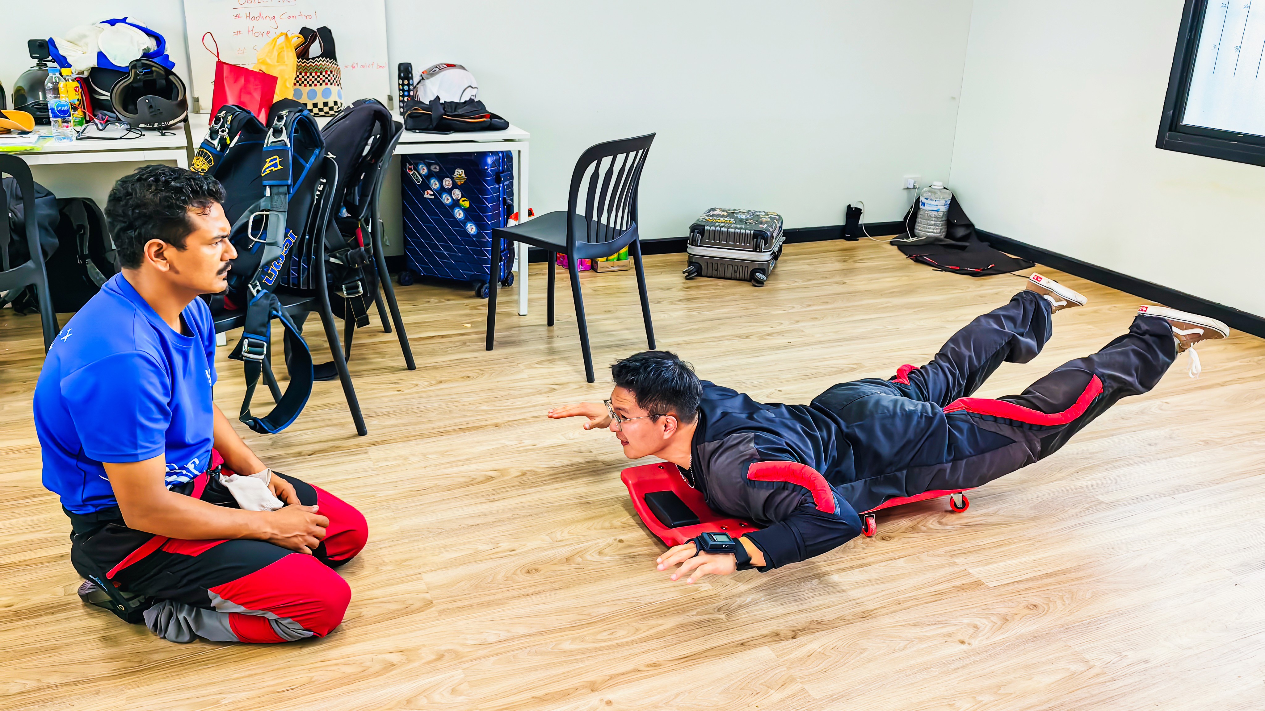 Students in ground school learning skydiving