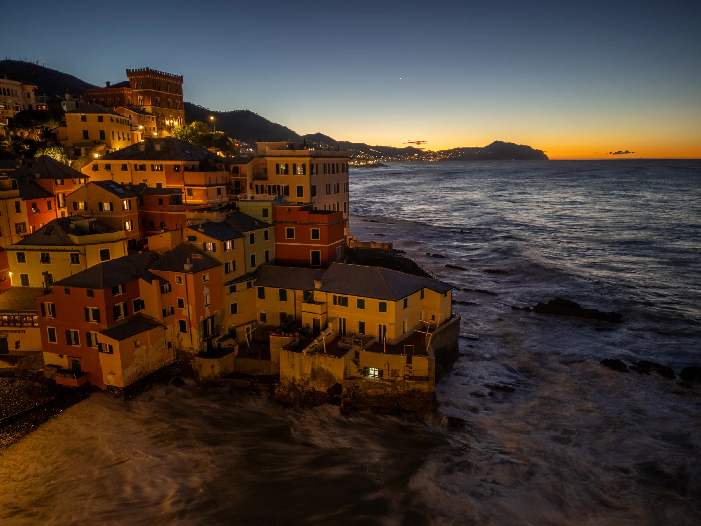 Aerial view of the harbour in sunset light — Boccadasse, Genoa, Italy. Photography by Yunes Calore.
