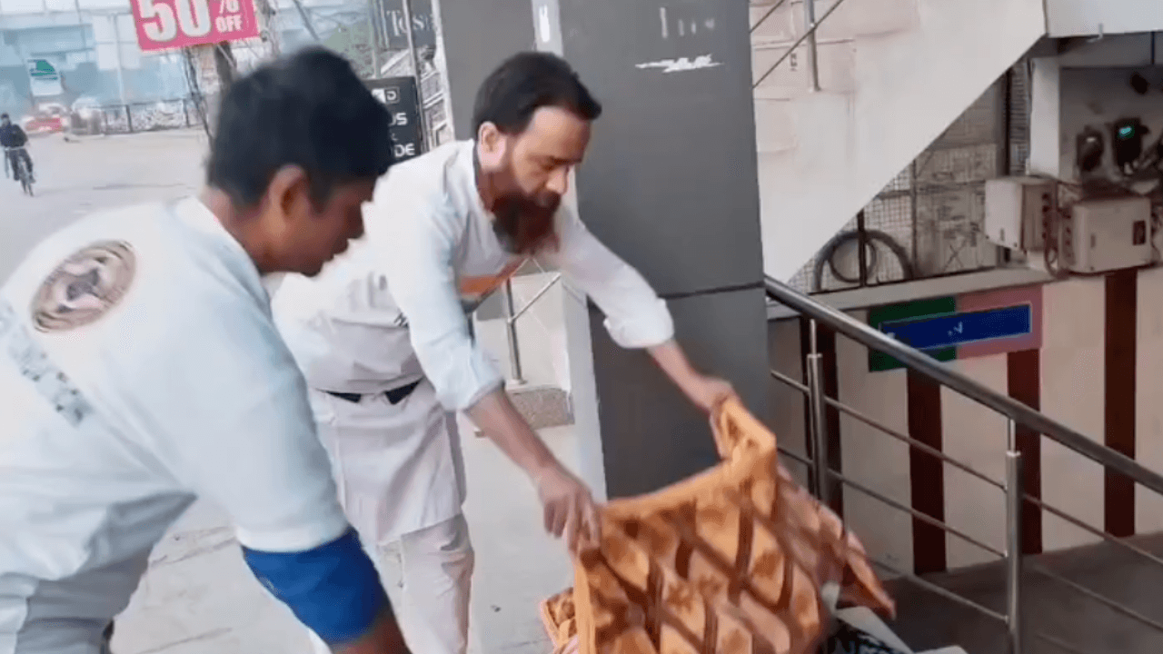 five children smiling while doing peace hand sign