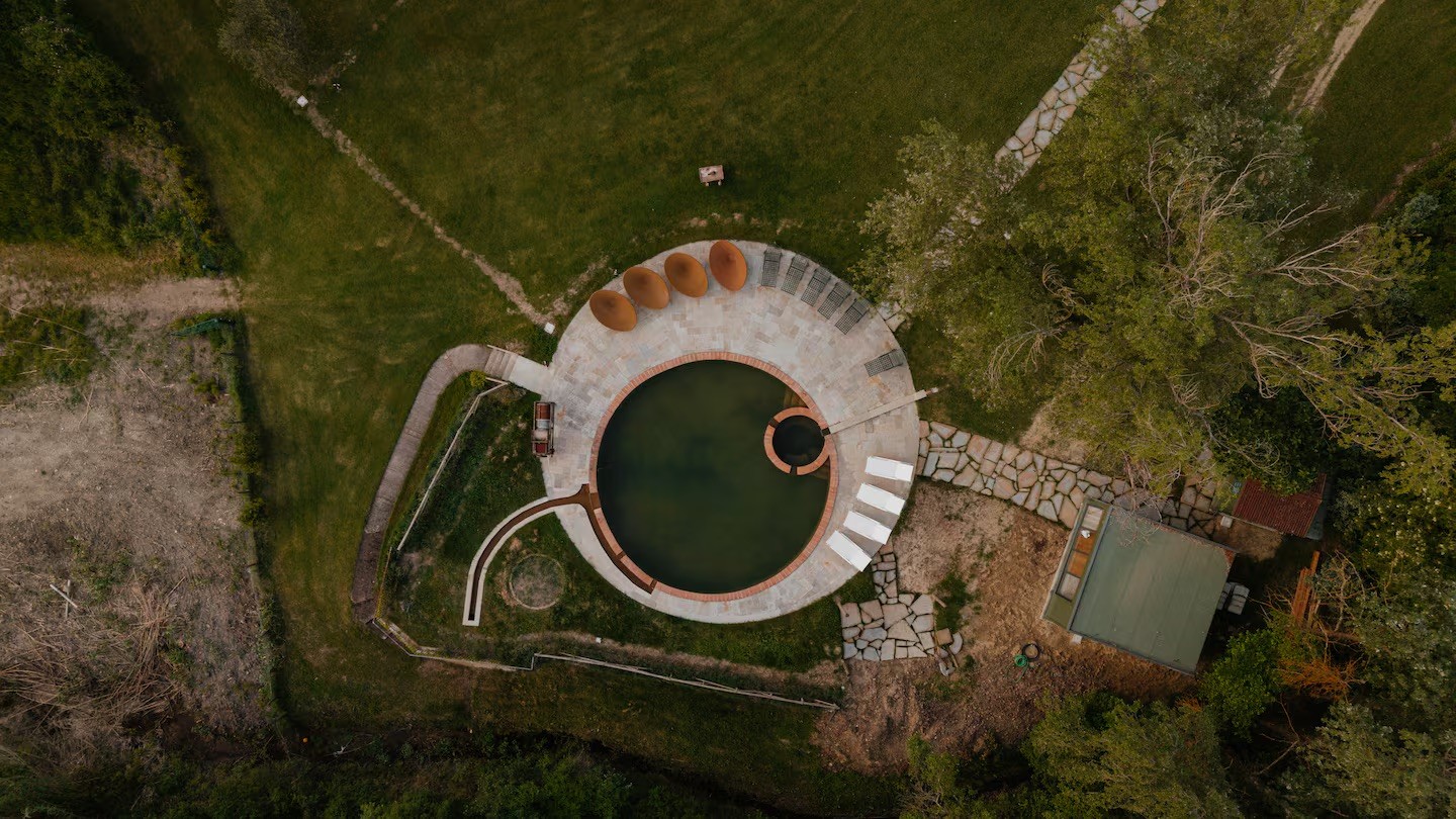 wellness luxury retreat experience in Tuscany during fall 2026, thermal pool