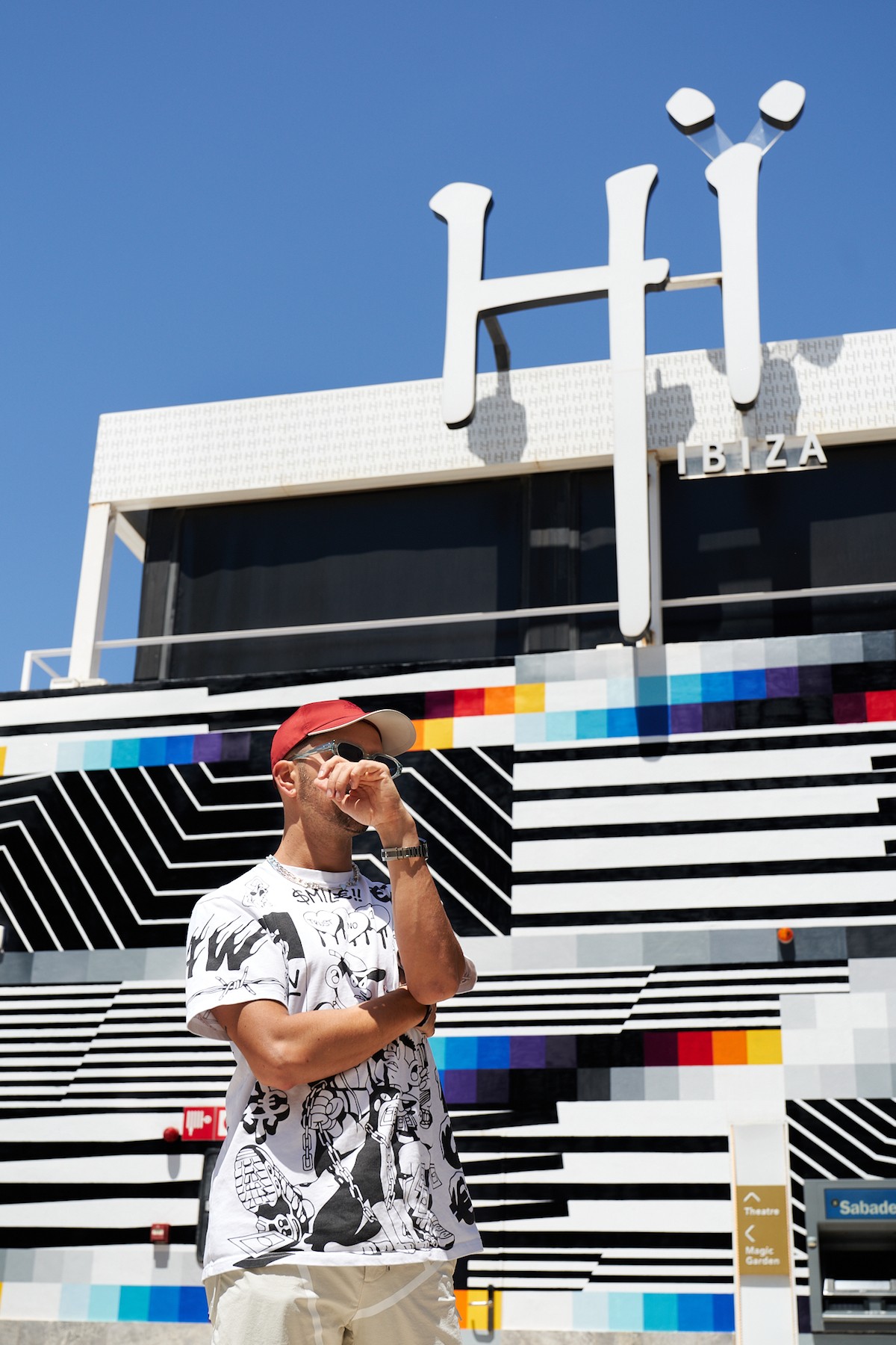 a white boat floating on top of a body of water
