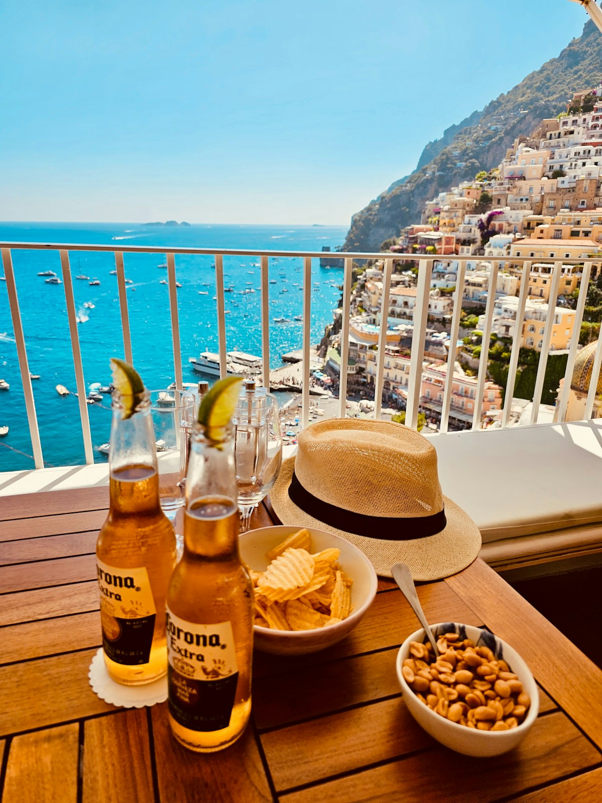 Drinks and snacks on a terrace overlooking Positano