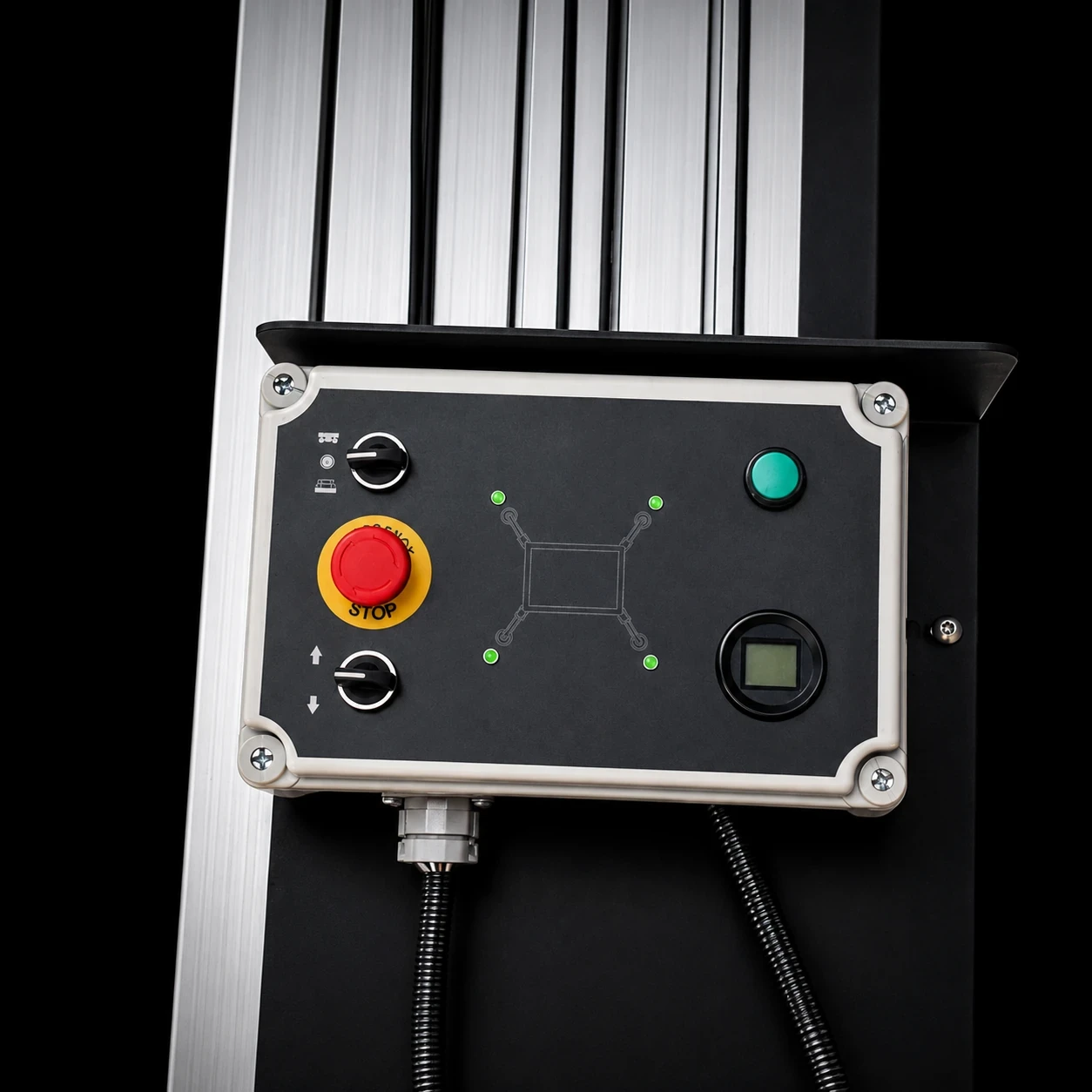 Ground-level control panel for single mast lift with emergency stop, status indicators and operating controls.
