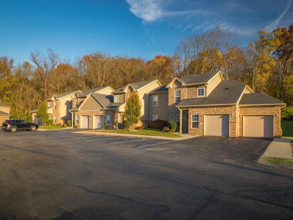 Townhome with sun shining on it