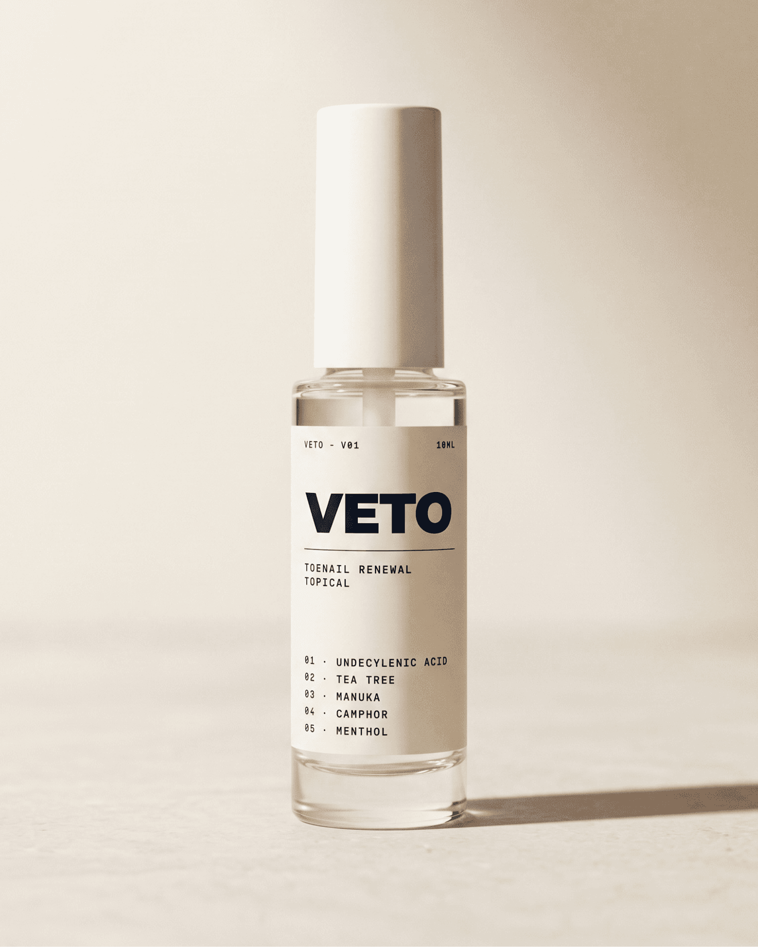 Veto nail renewal topical bottle on a beige background