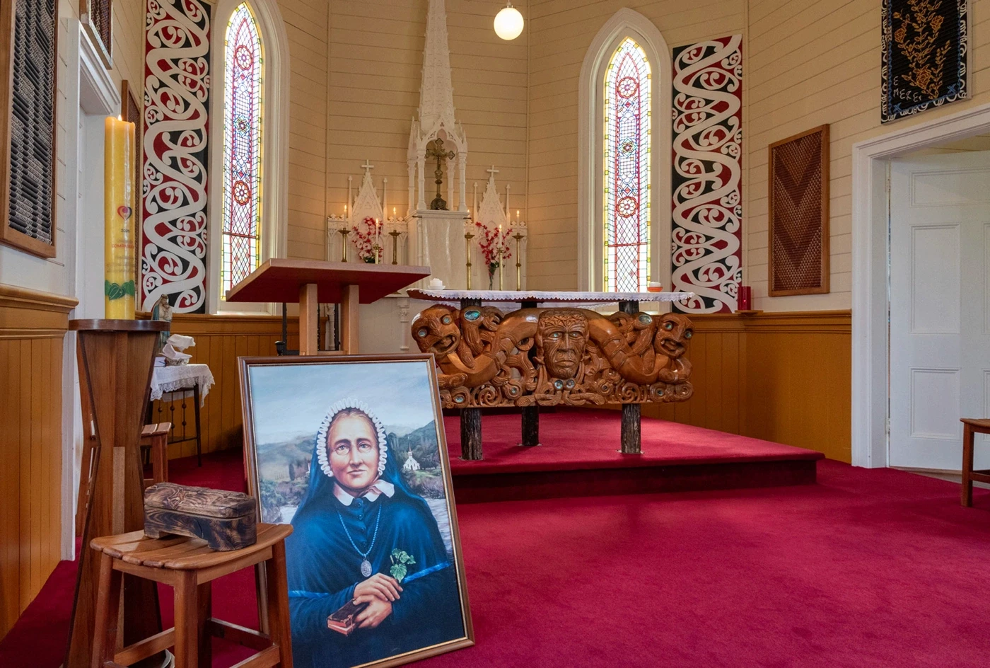 Church interior with portrait near altar