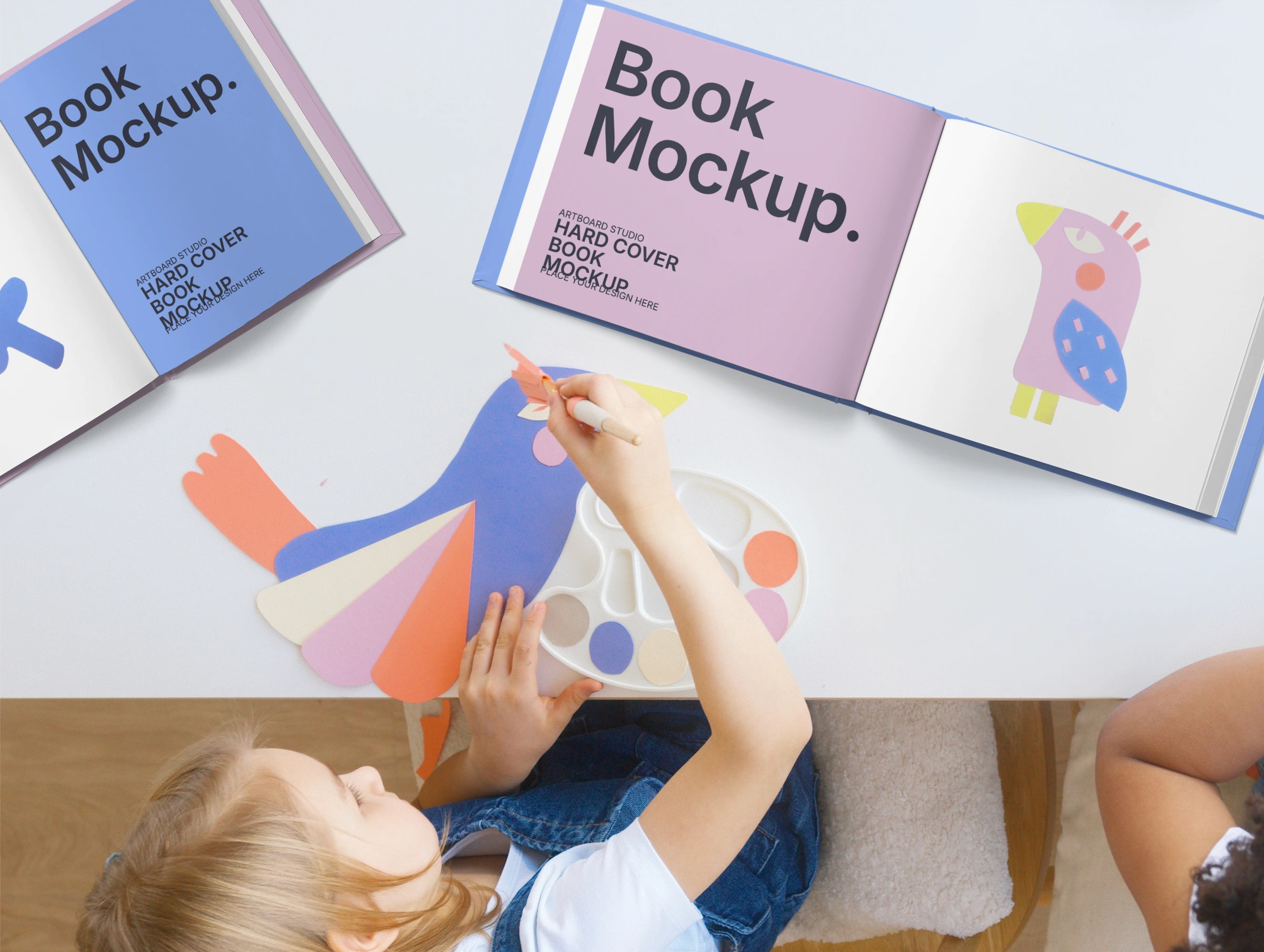 Hardcover book mockup on a table