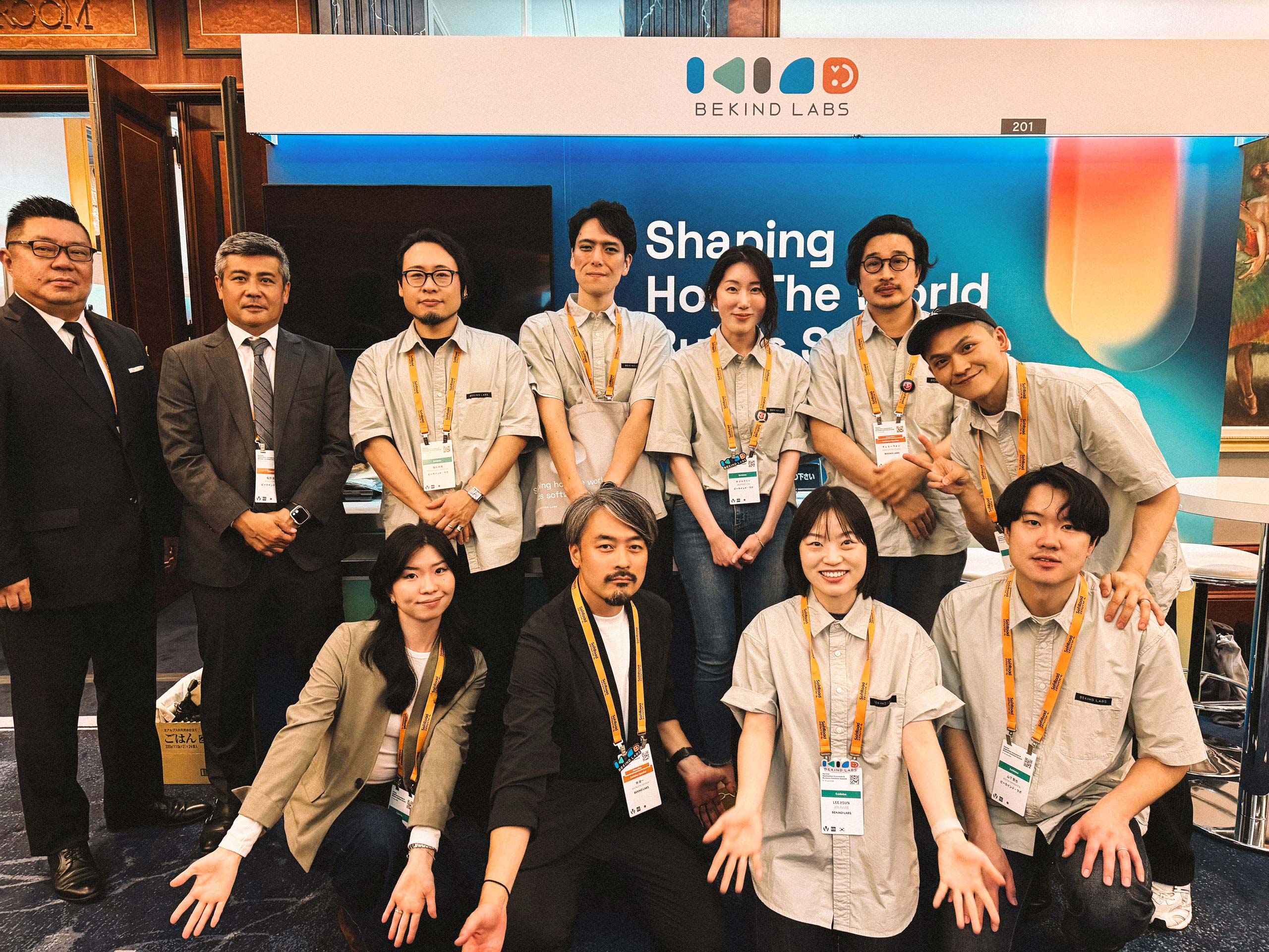 A group photo of Bekind Labs CEO Choi Hee-won and the team at their Gartner Summit 2026 booth, featuring the "Shaping How The World Builds Software" slogan, celebrating the event's conclusion.