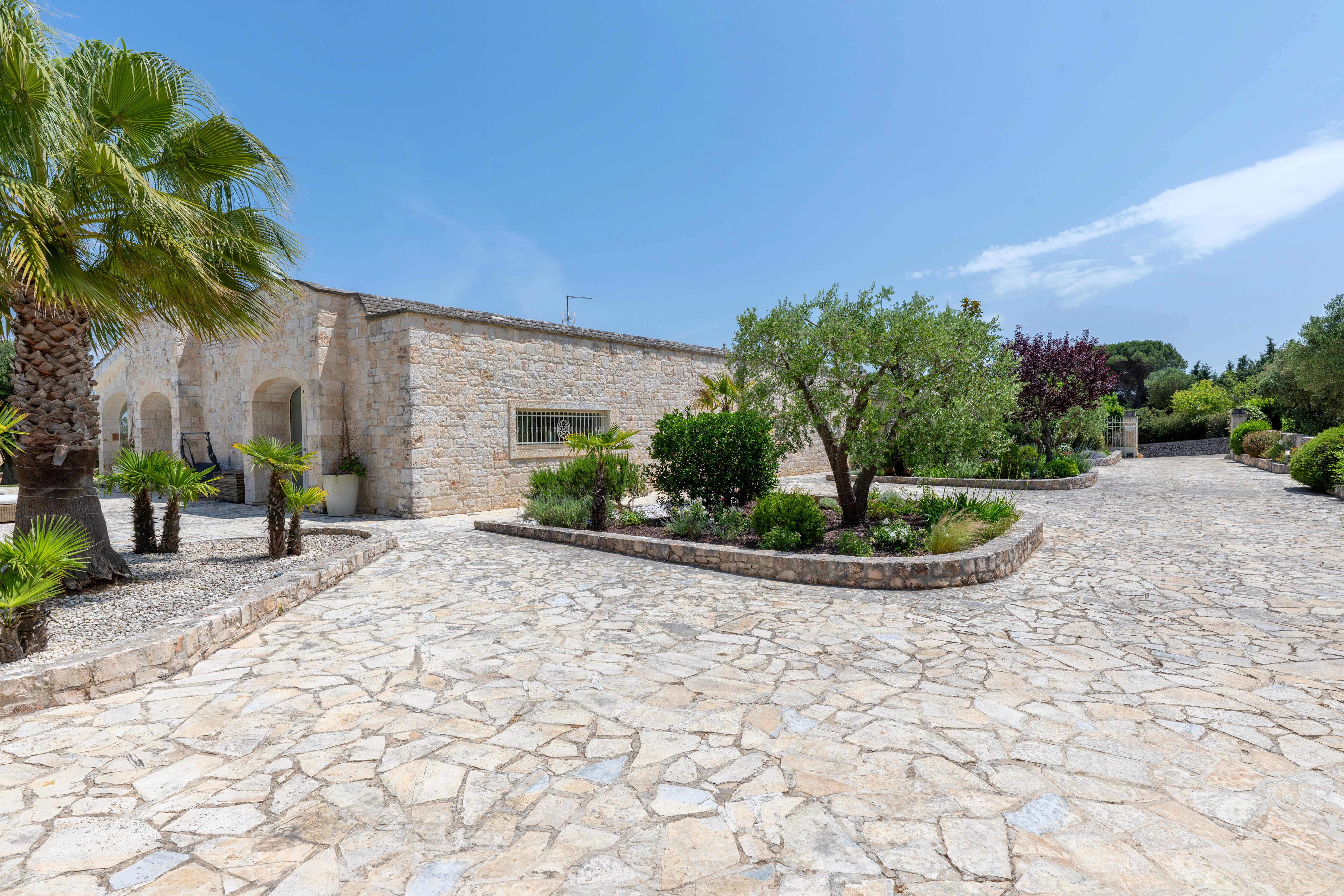 Modern building with tile facade on a hillside