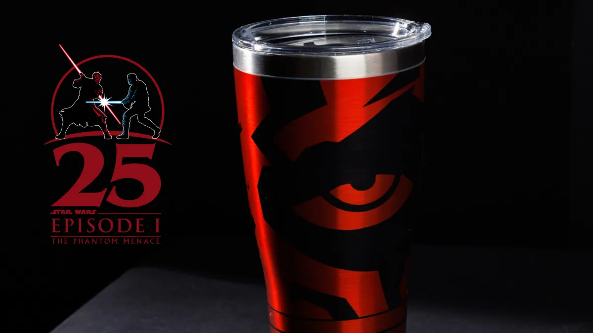 A Tervis tumbler with Darth Maul's face designed on it next to a logo for the 25th Anniversary of The Phantom Menace