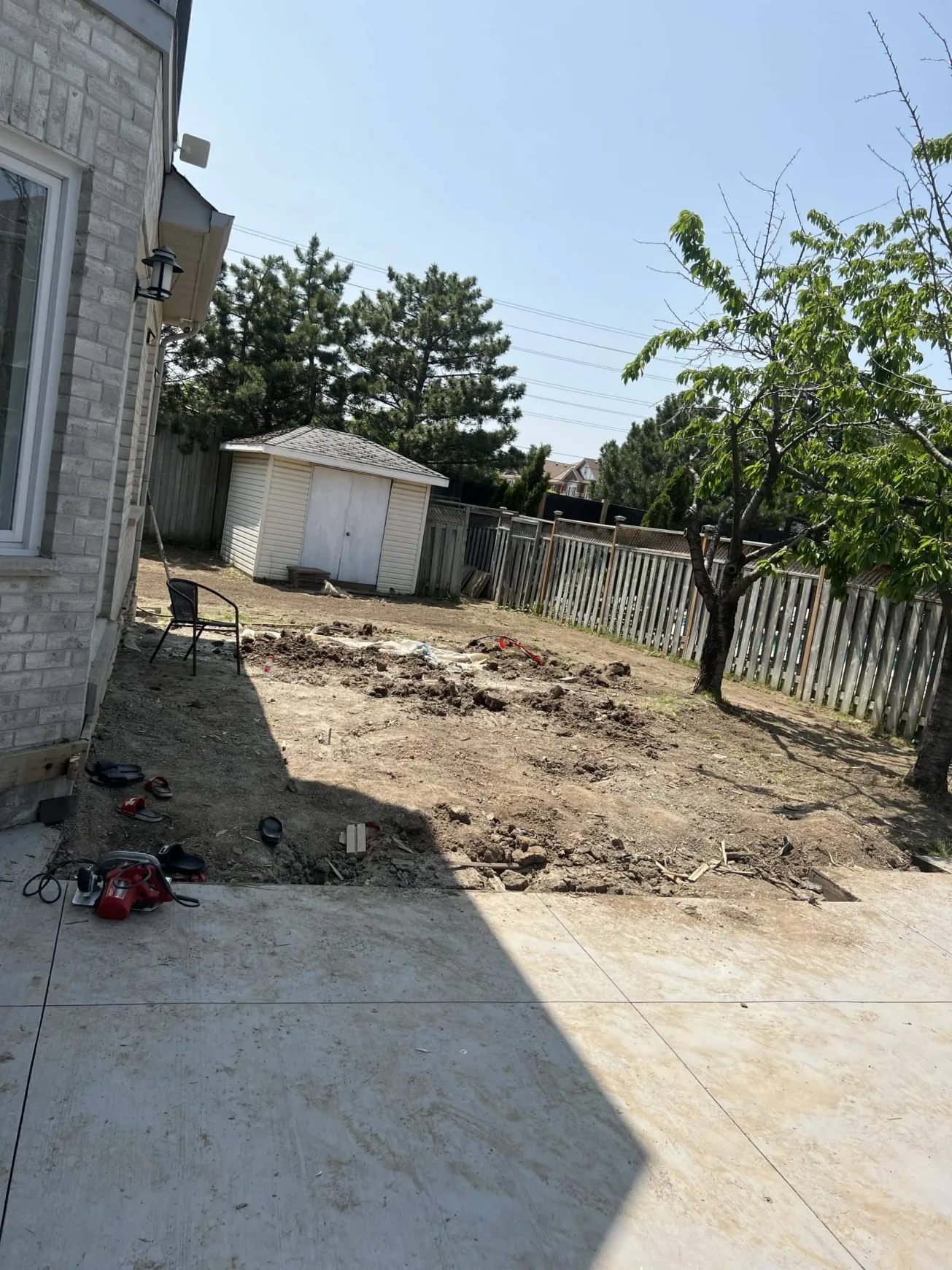 Backyard cleared and leveled for upcoming construction work
