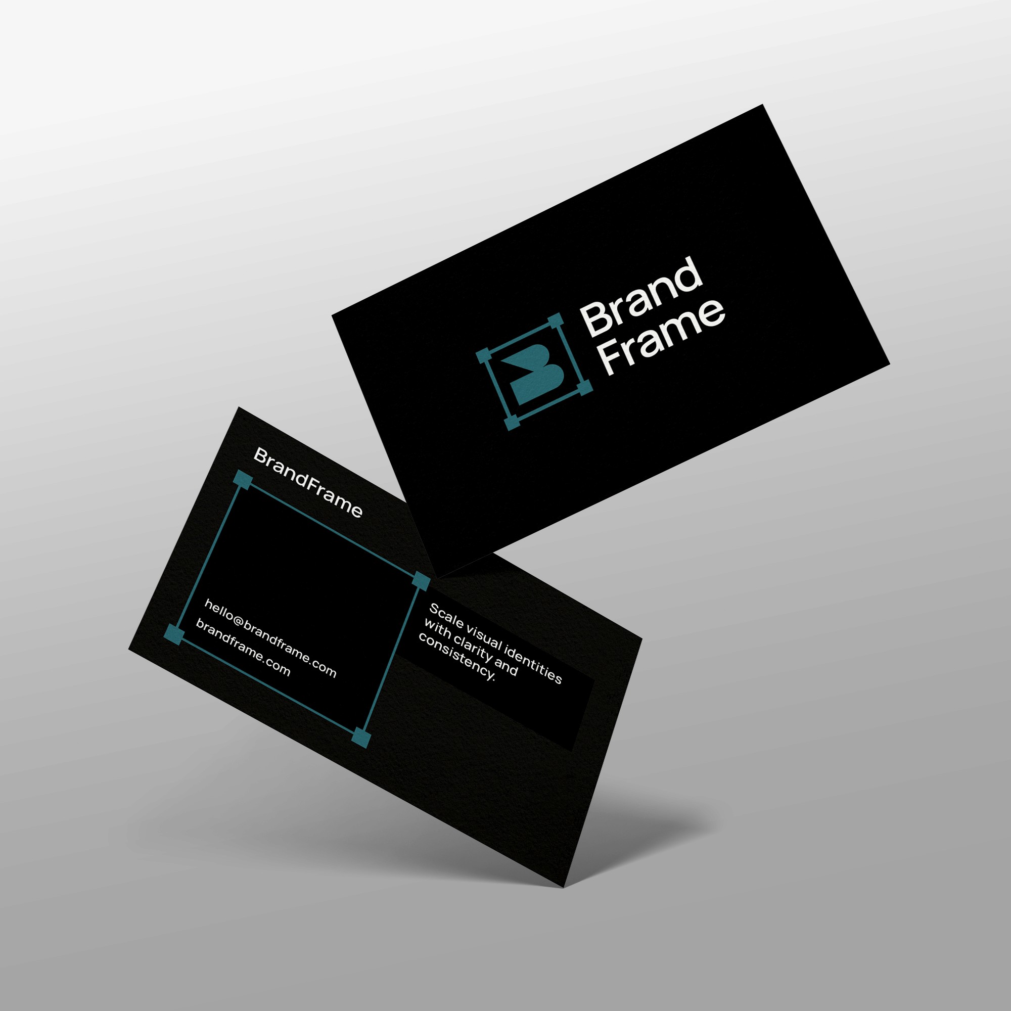 Two minimalist black business cards for BrandFrame floating against a light gray gradient background. The top card shows the brand's teal "B" logo inside a square frame. The bottom card displays contact information, the company website, and the slogan "Scale visual identities with clarity and consistency" in clean white sans-serif typography.