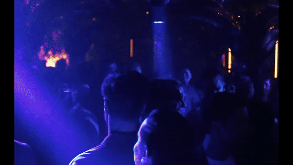 Close-up of person's feet in tan shoes