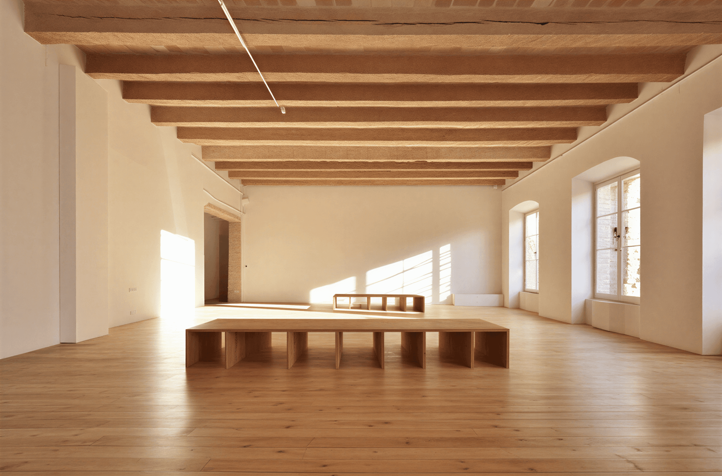 brown terracotta table at the center of a room