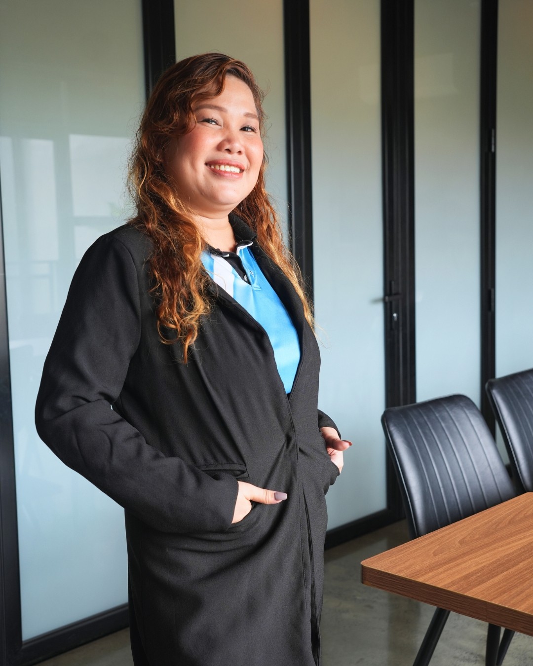a picture of Mia Hernando, a real estate receptionist of the team