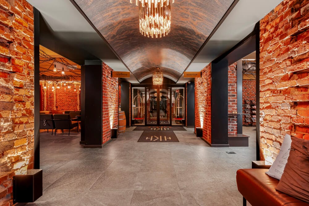 A man standing with Sufboard