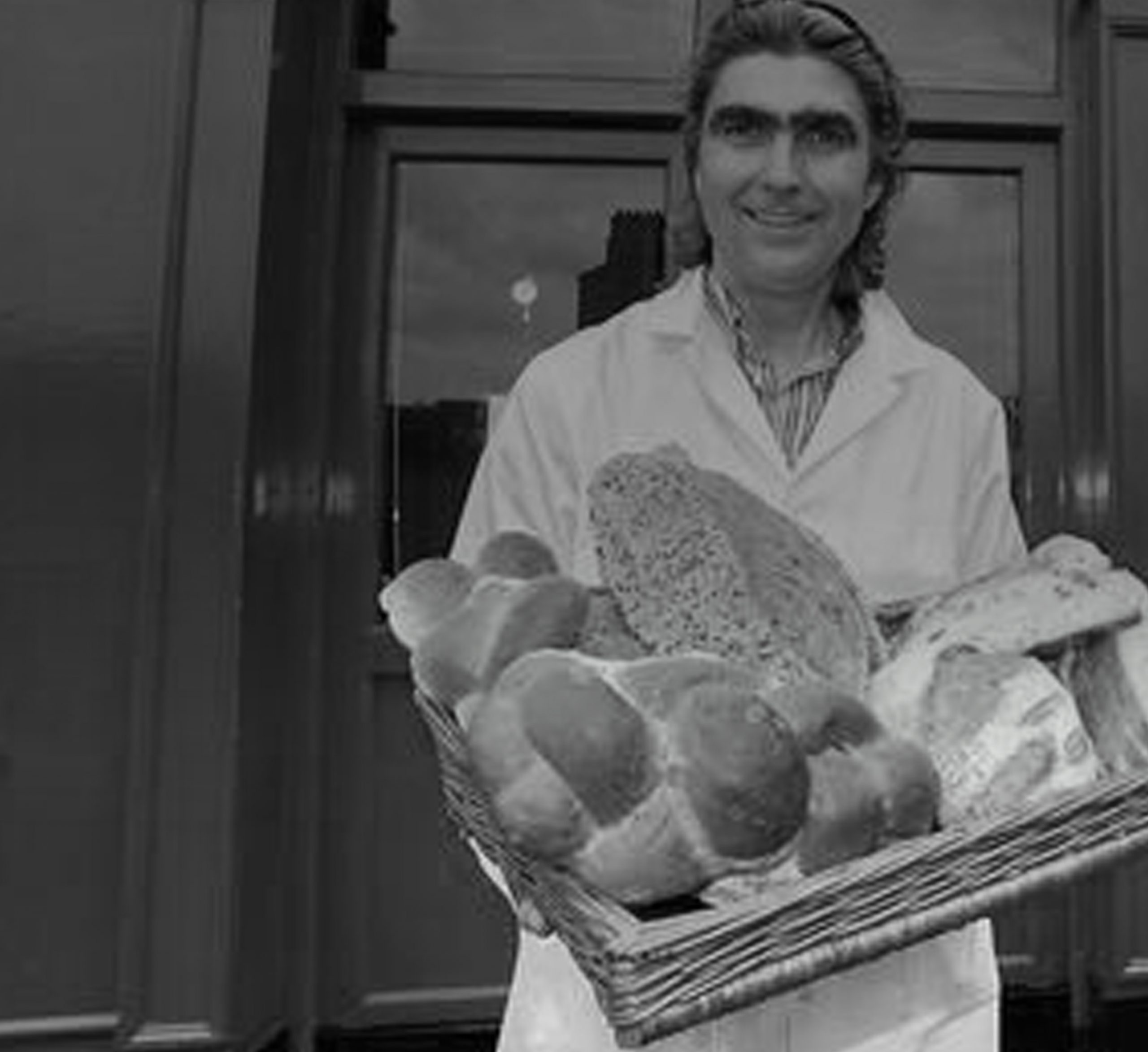 Owner of the Pretzel Bakery showing off her Bretzels and laughing while supplying their goods to As One Restaurant Dubliln