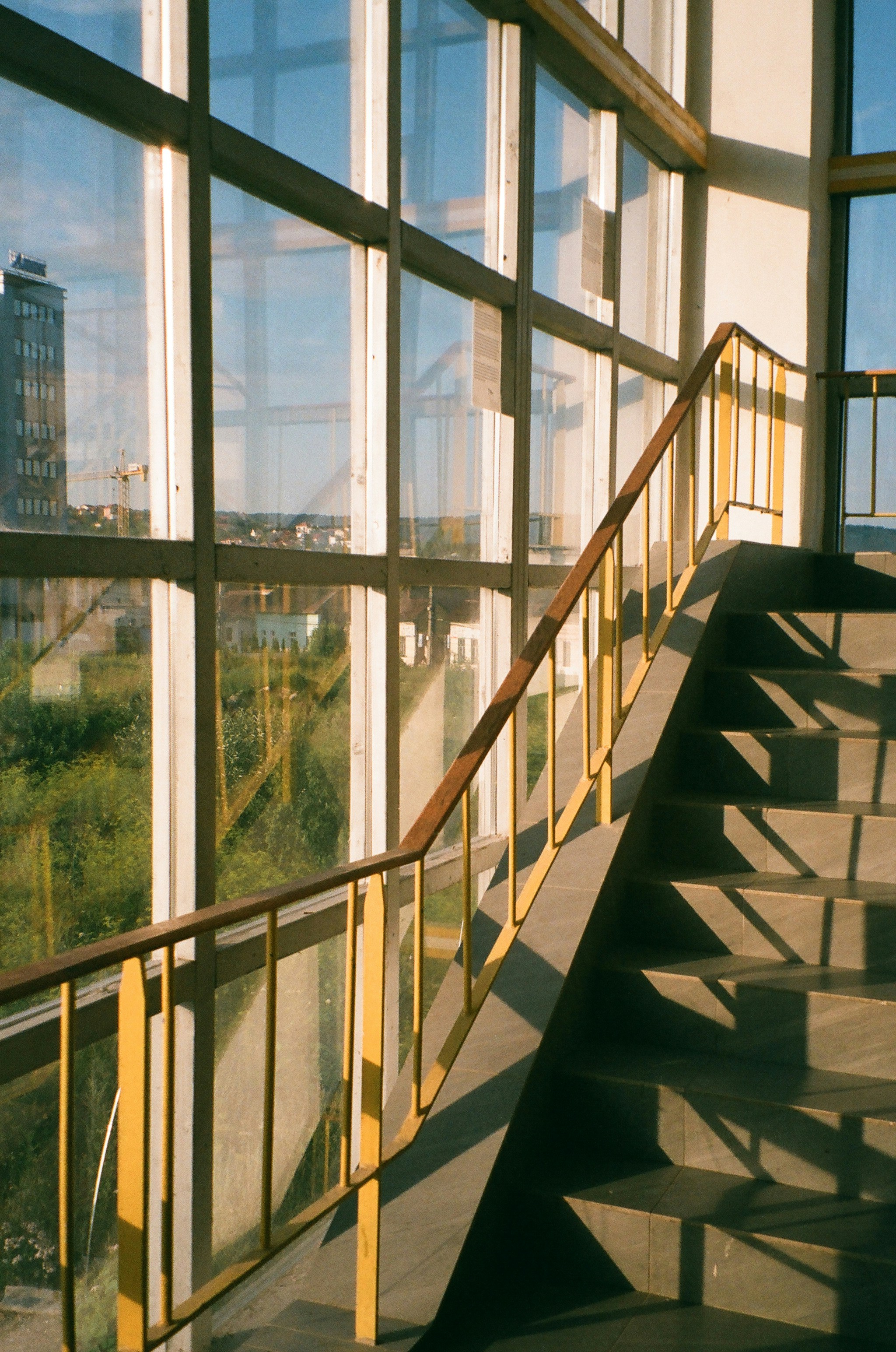 white metal framed glass window