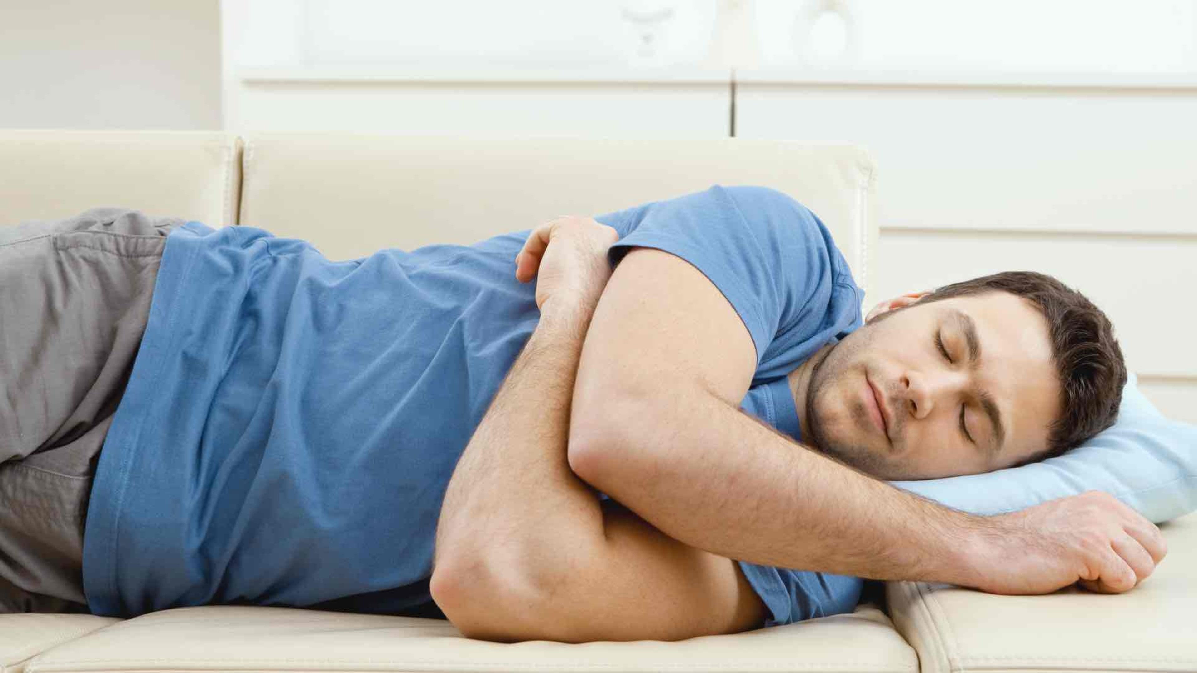 a man sleeping on his side