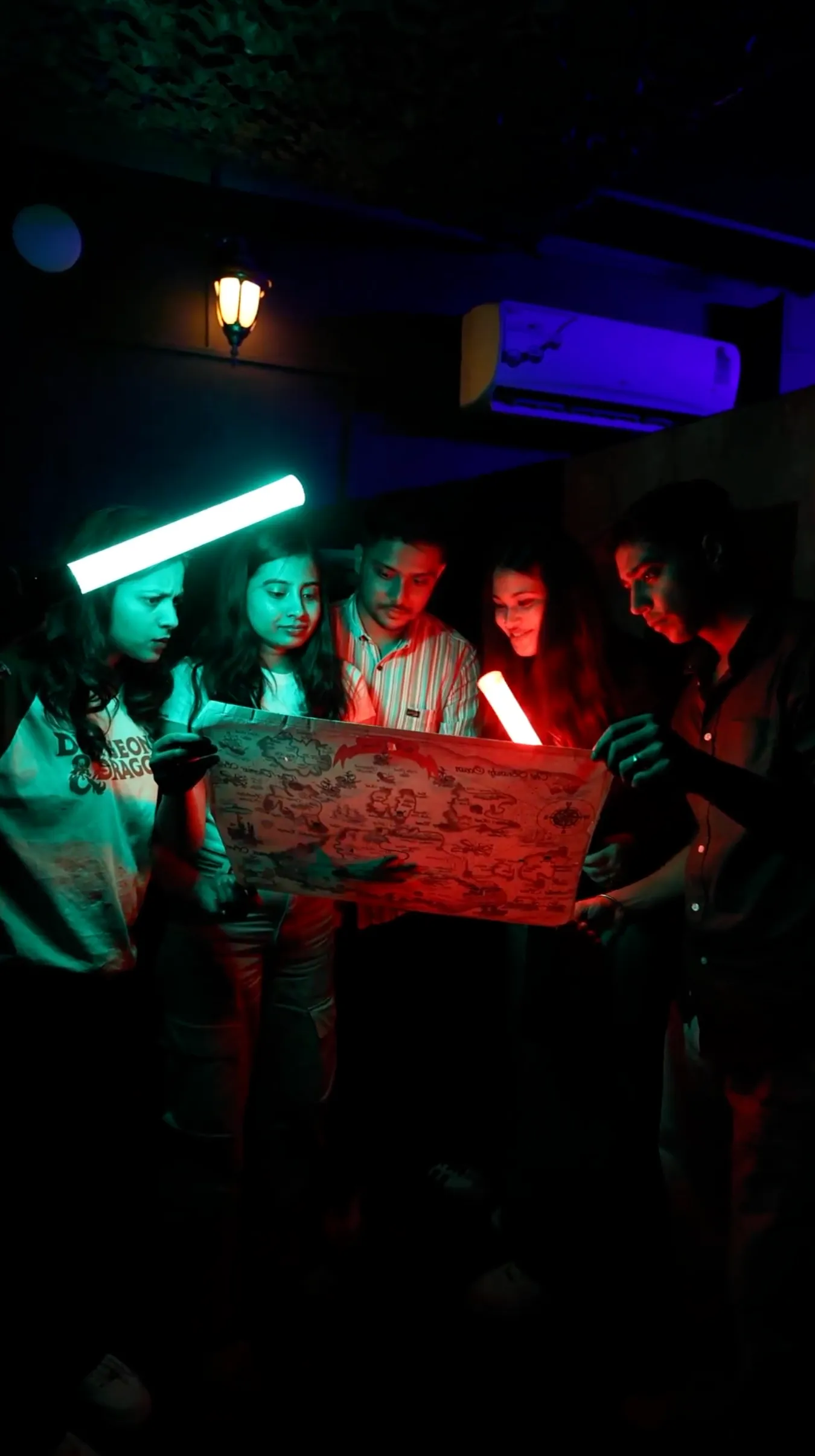 Team stranded in a tropical setup inside Lost in an Island escape room – a thrilling escape game near me