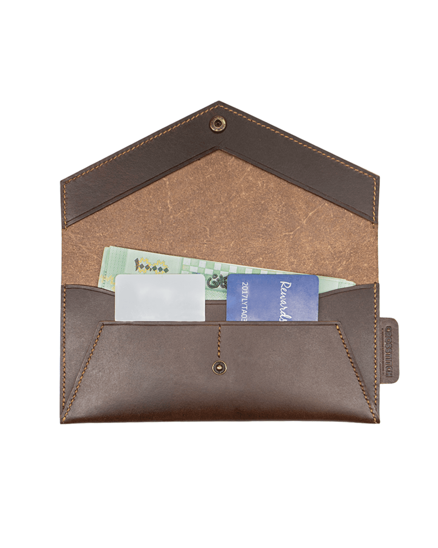 Crosstitch Leather money envelope with cash and cards inside, made from full-grain brown leather with handcrafted stitching.