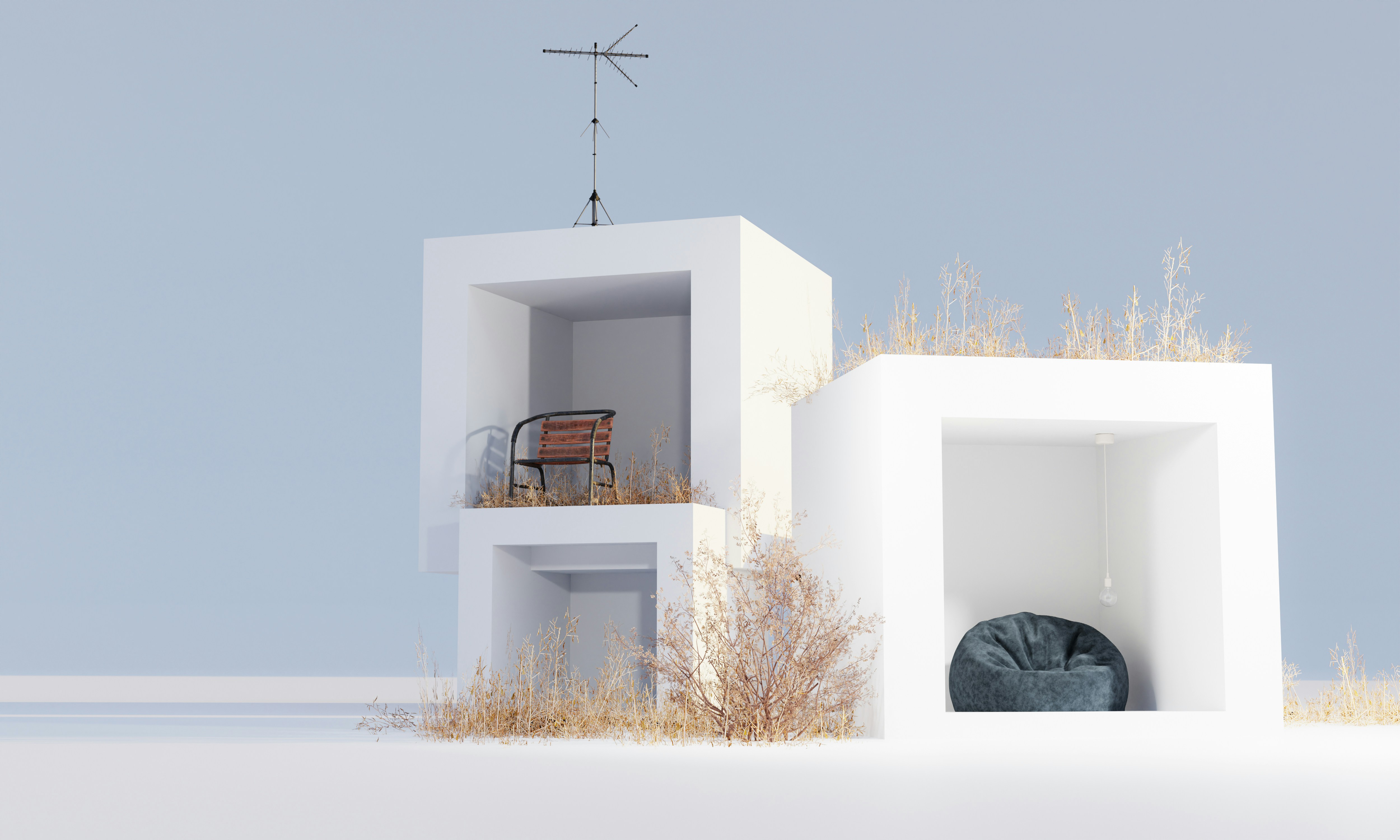 A small white building with a chair in it