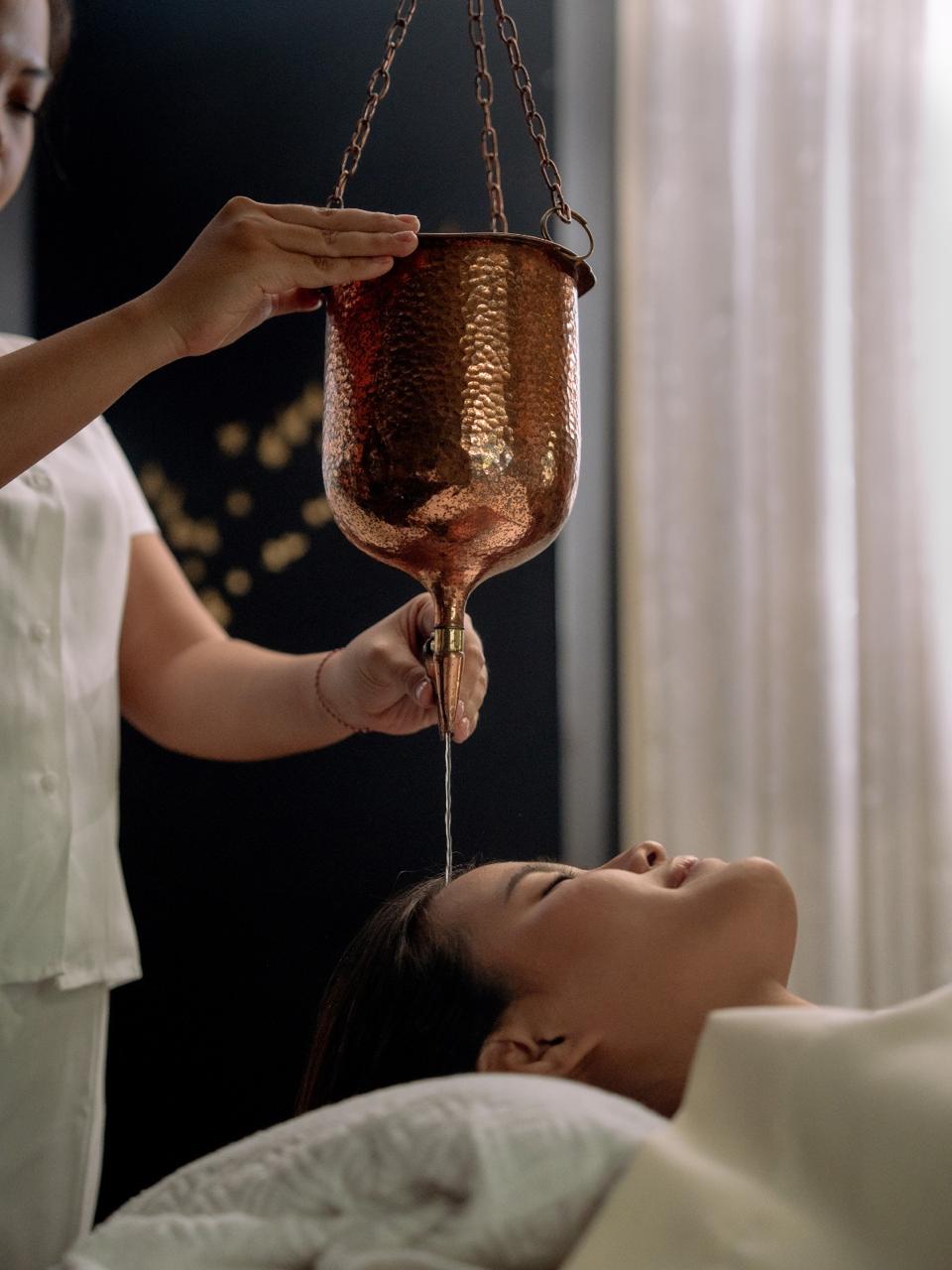 person making a contactless payment with a card